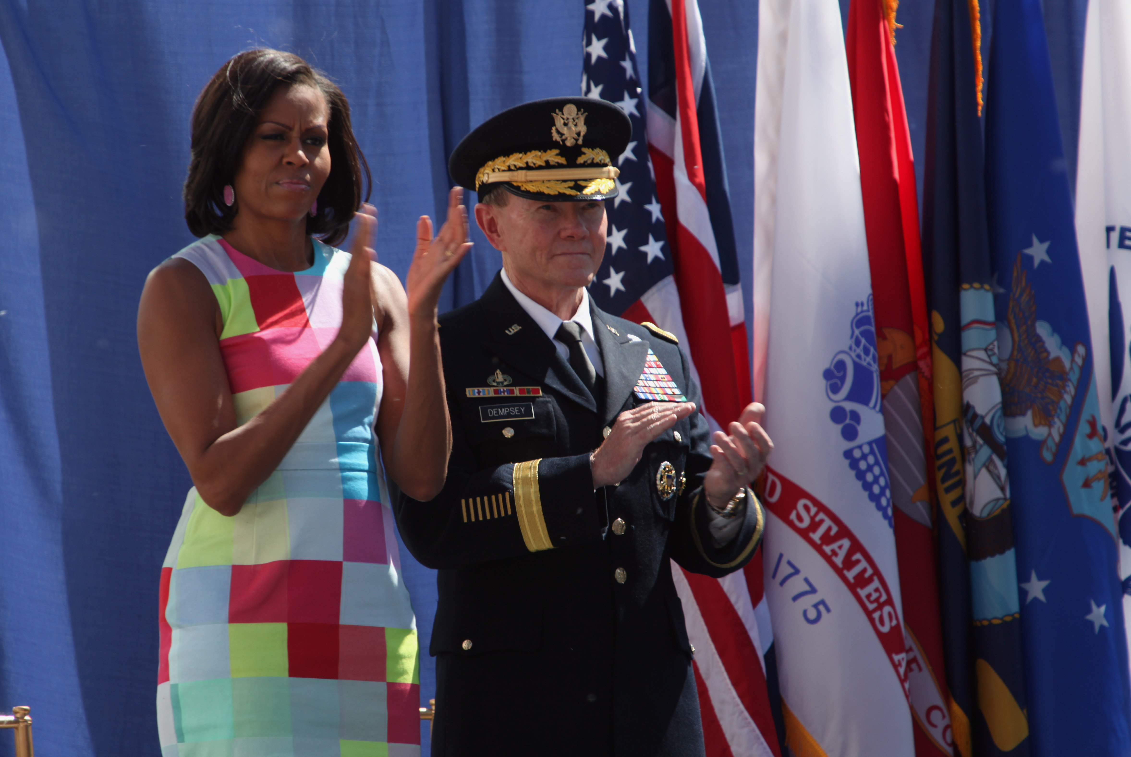 Michelle Obama and Gen. Martin E. Dempsey applaud, April 30, 2012