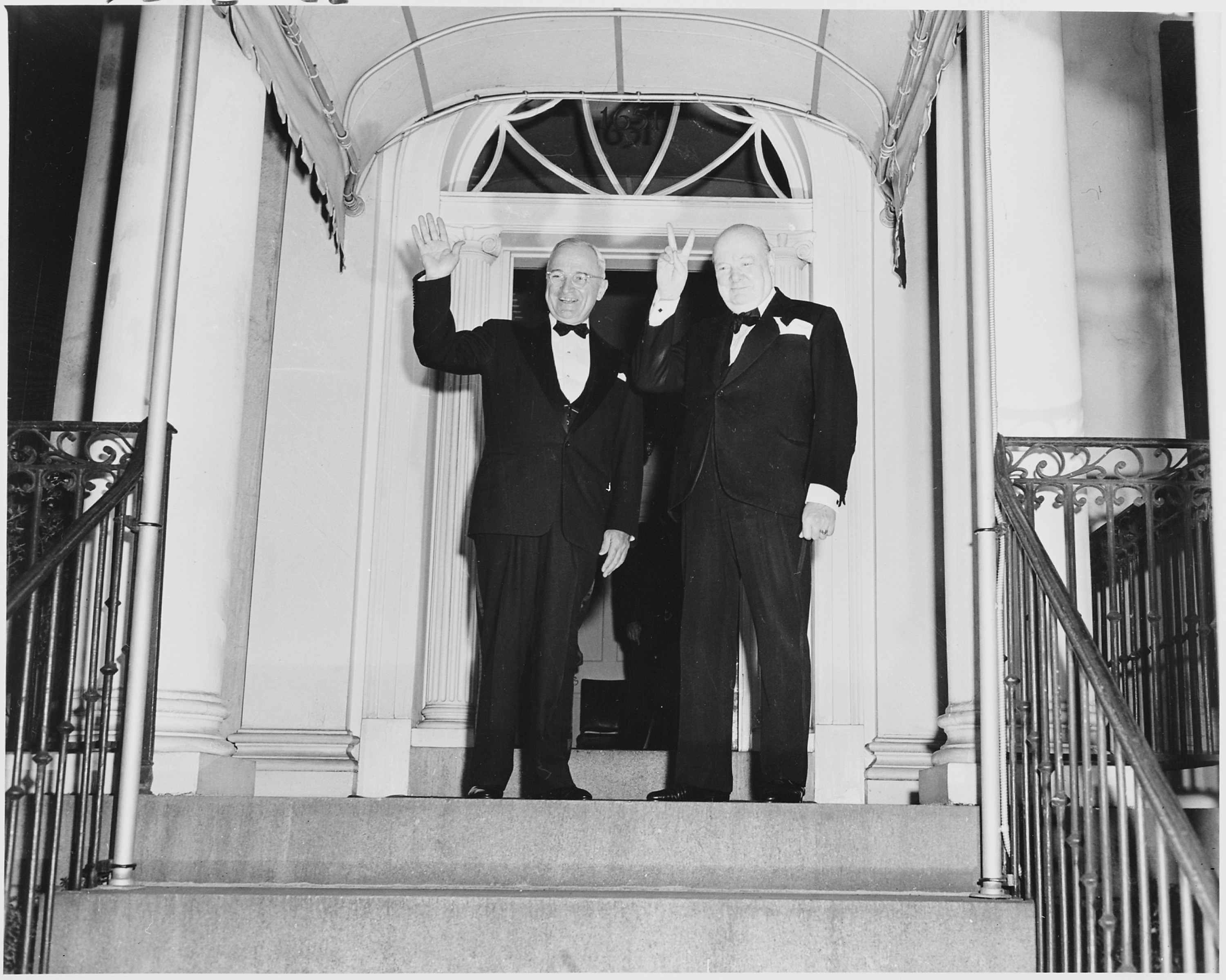 Photograph of Winston Churchill flashing his 