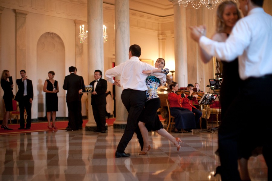 Dancers in the Grand Foyer of the White House during the Ambassadors Reception, hosted by President Barack Obama and First Lady Michelle Obama, on July 27, 2009