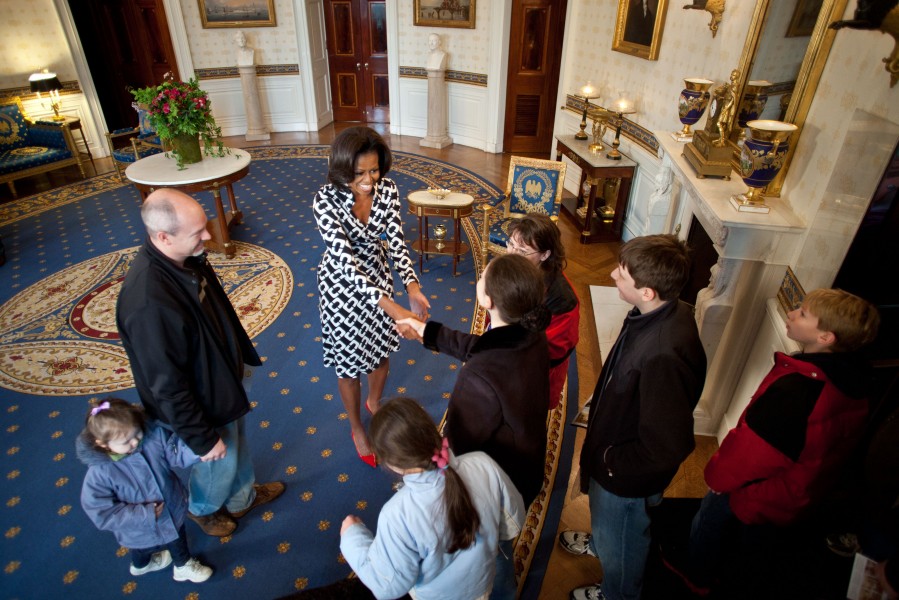 Michelle Obama greets members of the general public as they enter the Blue Room, 2012