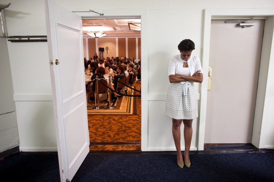 Michelle Obama waits to be introduced during an event at the Claremont Hotel Club & Spa in Berkeley, Calif., June 14, 2011