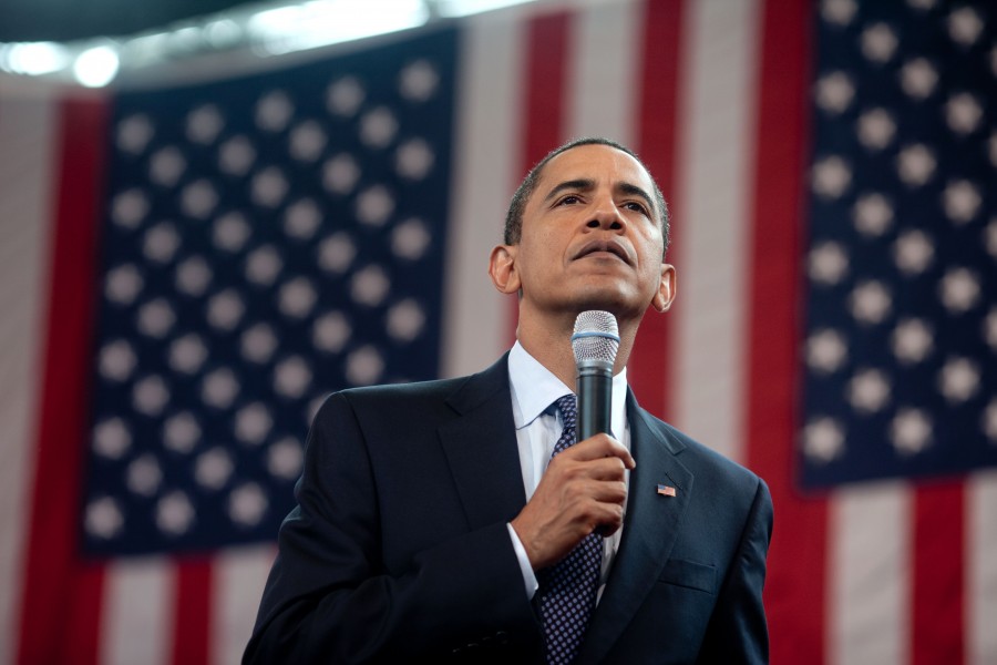 President Barack Obama listens to a question during a town hall meeting at Broughton High School in Raleigh, N.C.