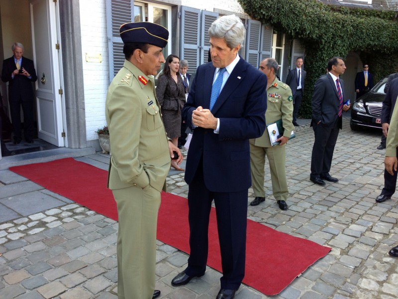 U.S. Secretary of State John Kerry bids farewell to Pakistani Chief of Army Staff General Ashfaq Kayani after their trilateral meeting with Afghan President Hamid Karzai in Brussels, Belgium, on April 24, 2013