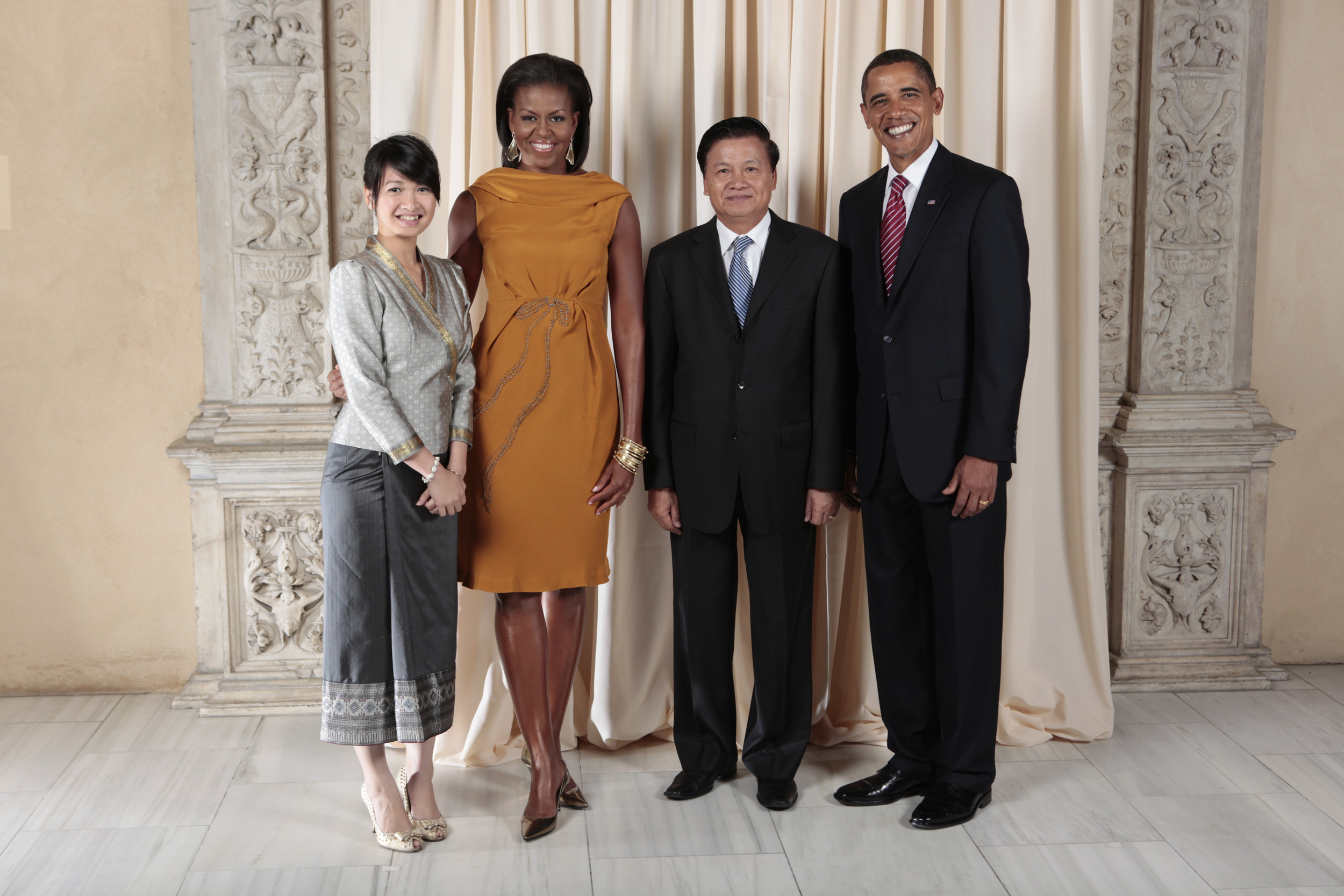 Thongloun Sisoulith with Obamas
