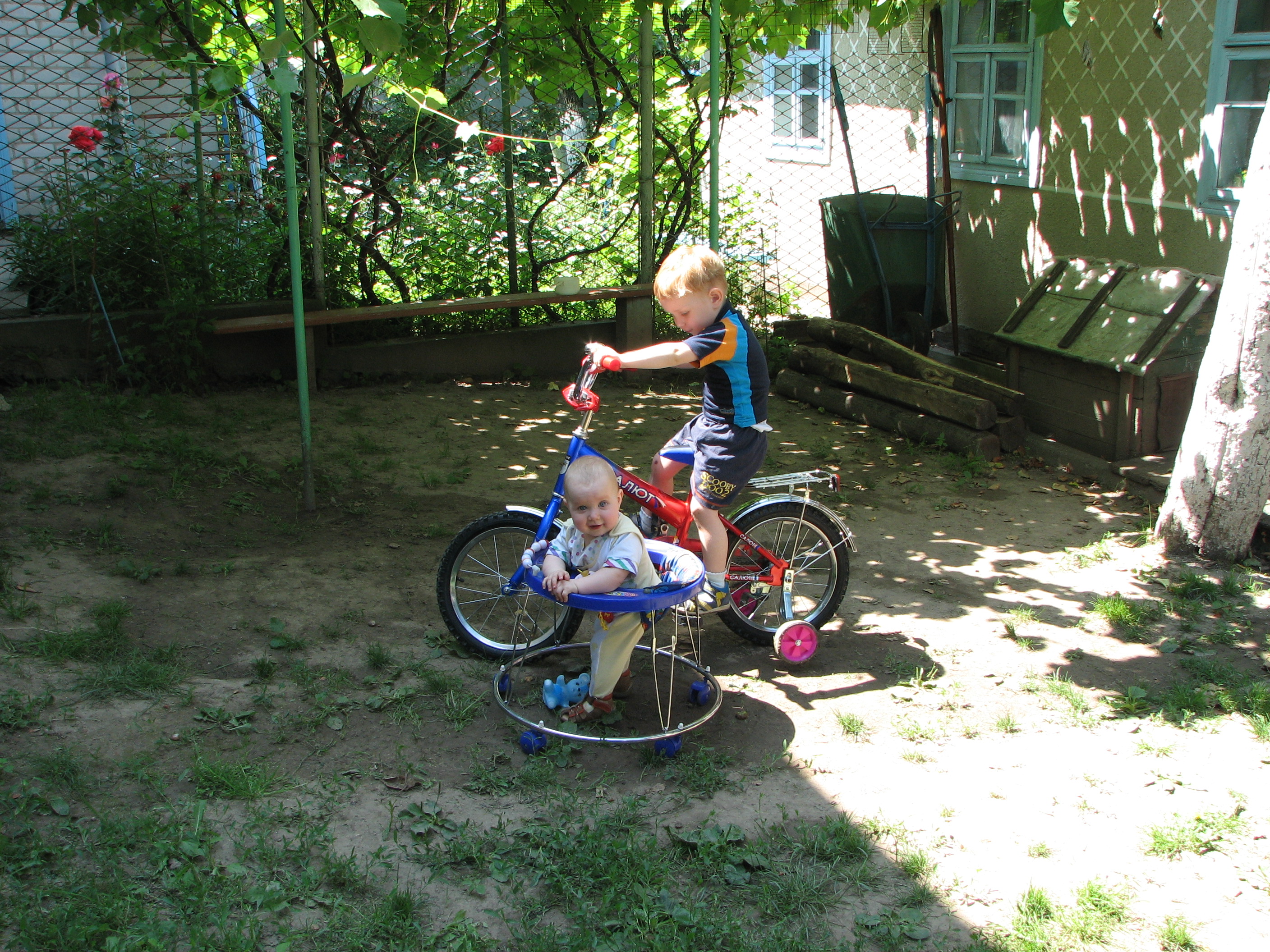 A baby kid girl learning to walk and her brother, picture 032