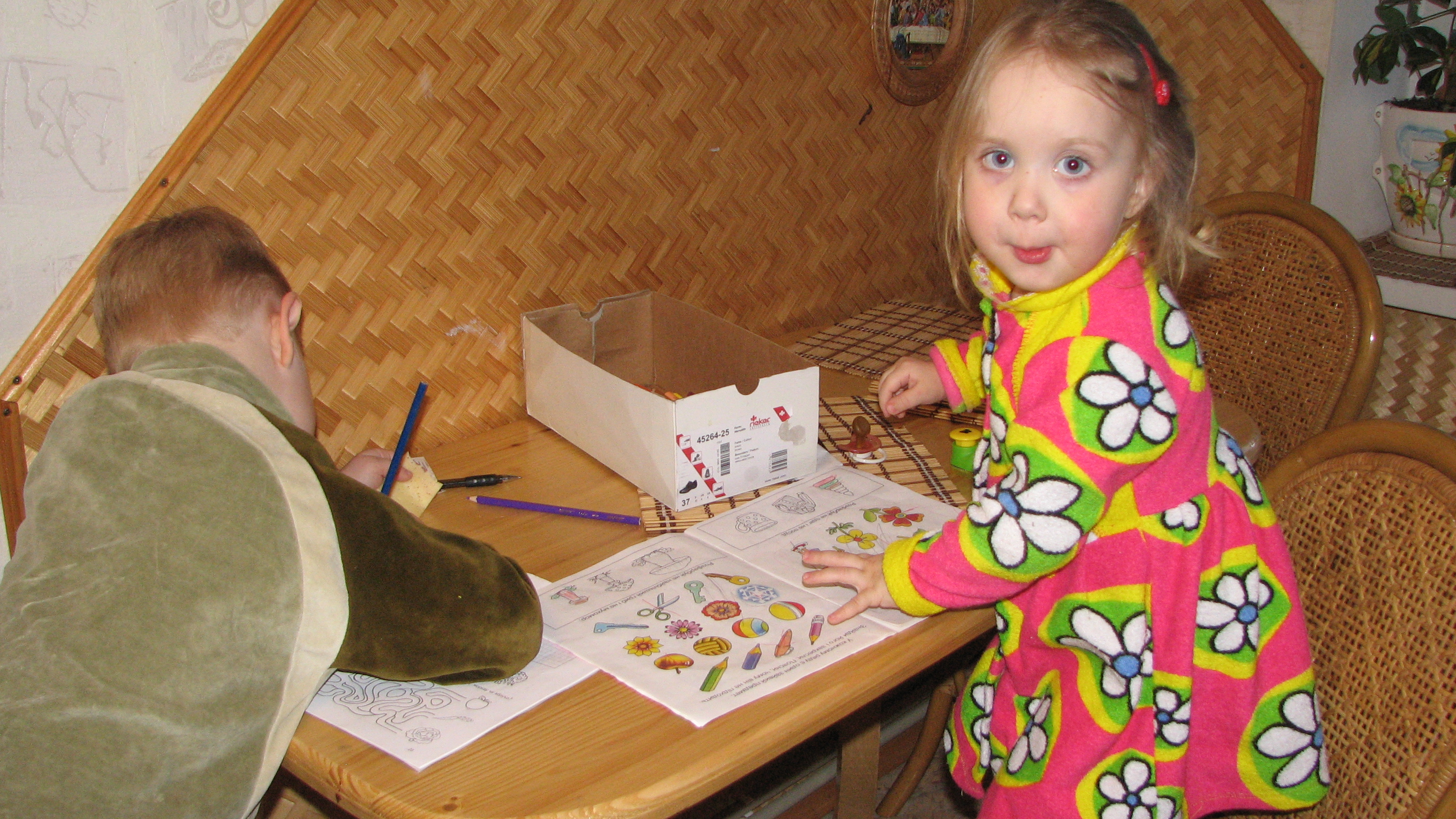 Small kids doing their studies, picture 2