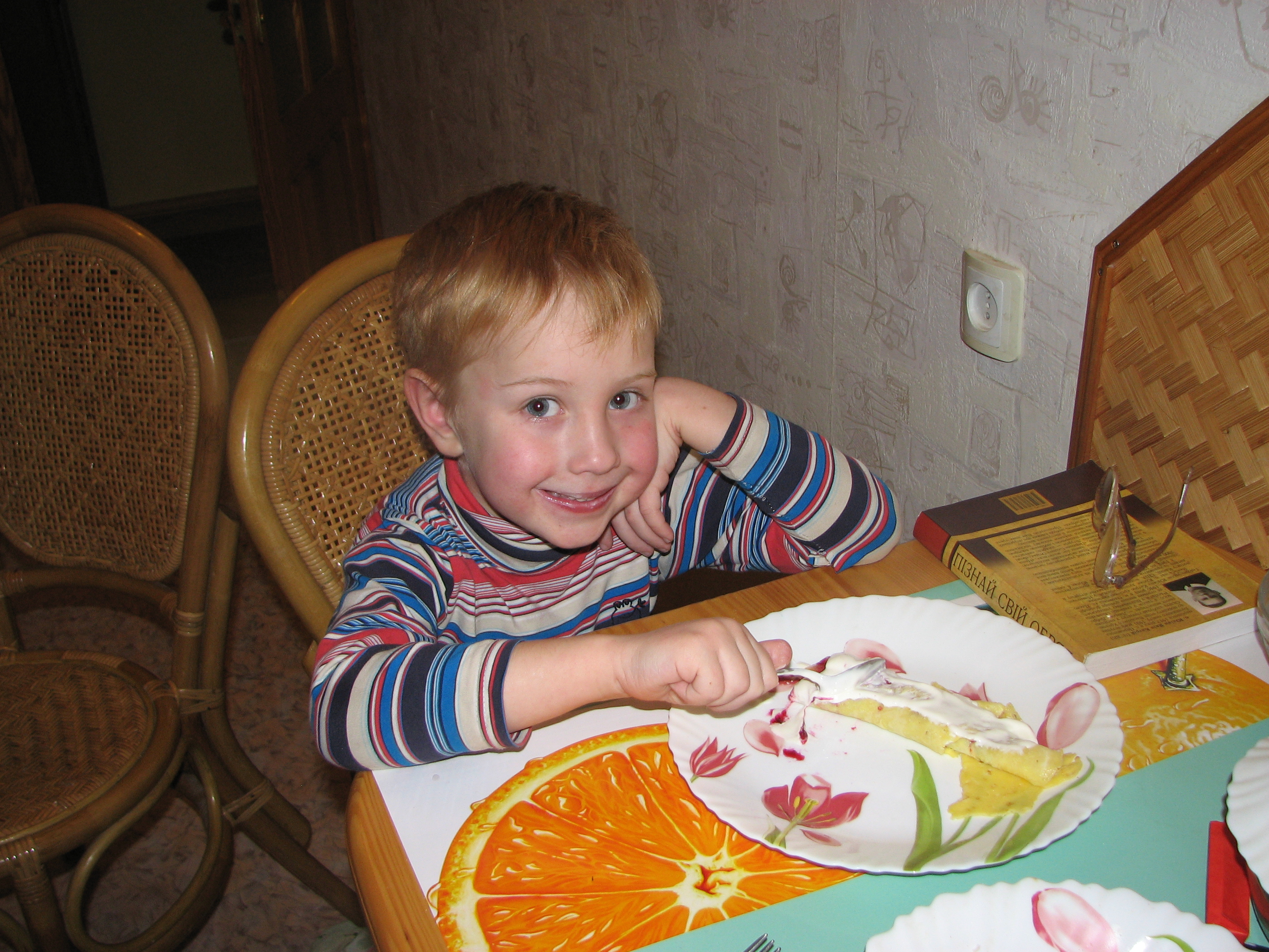 a small boy having meal