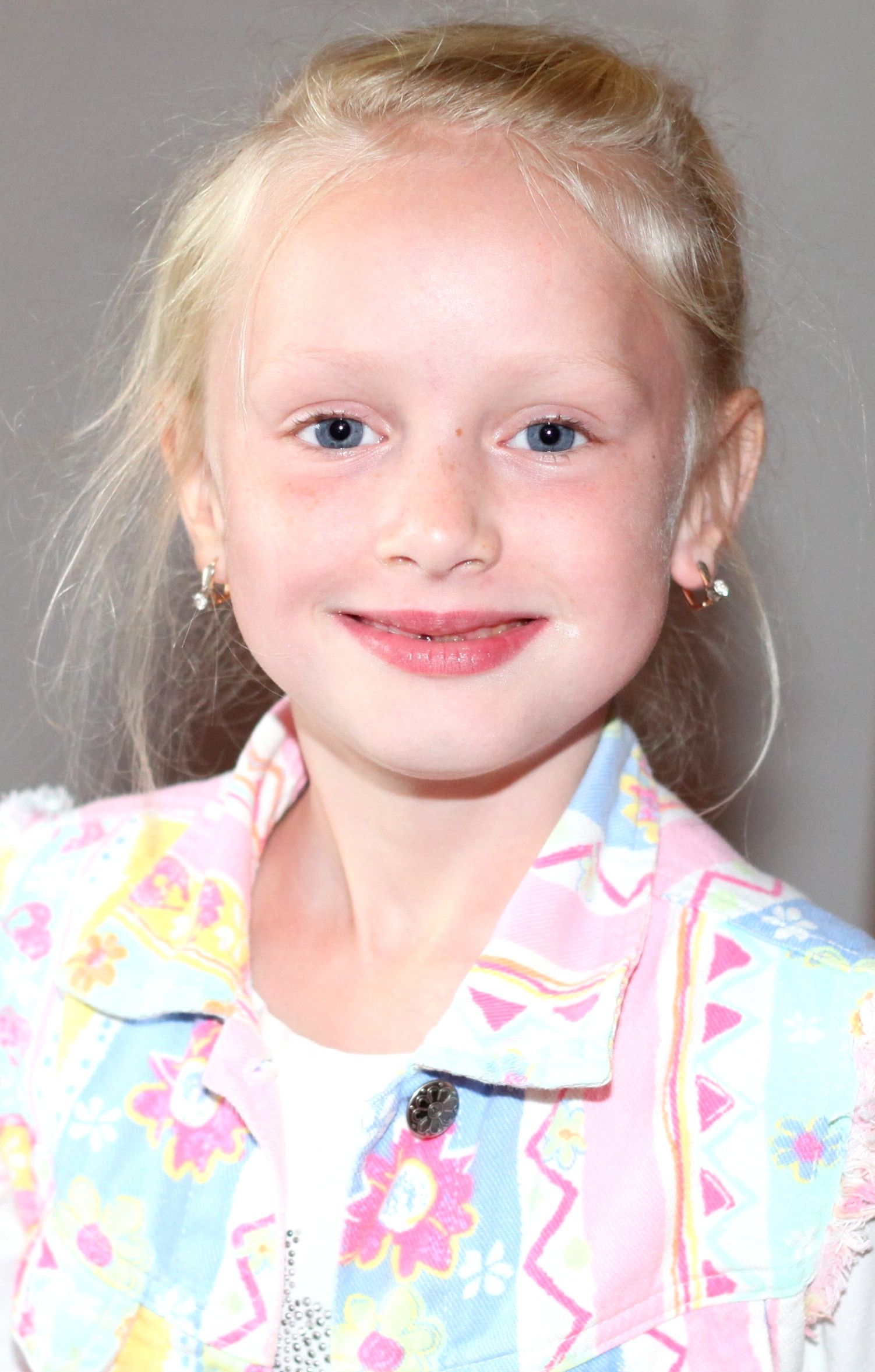a beautiful blond Catholic child girl, picture 2