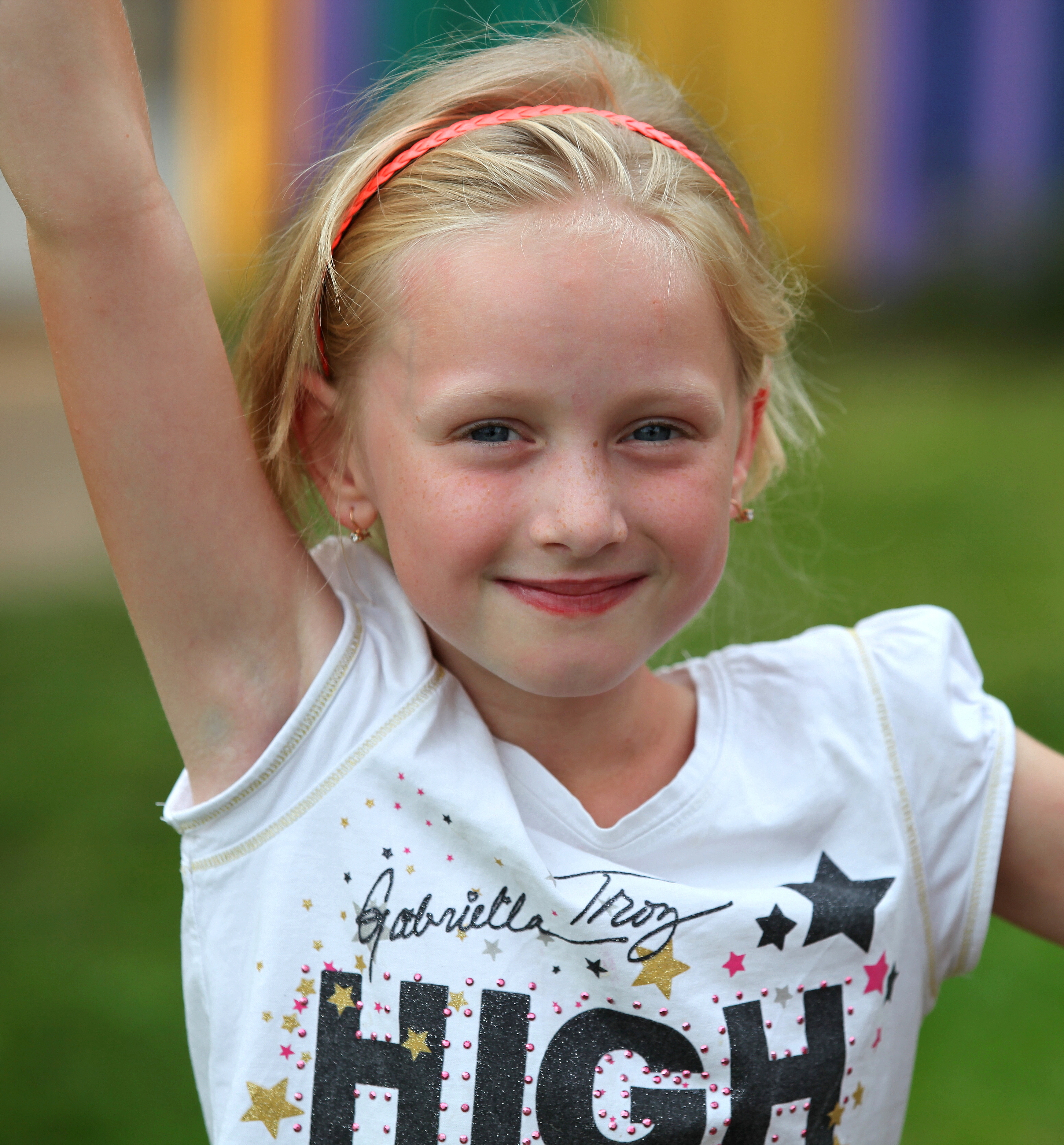 a blond beautiful young charming girl (a Catholic Christian) in a Christian camp in July 2013, picture 1/8