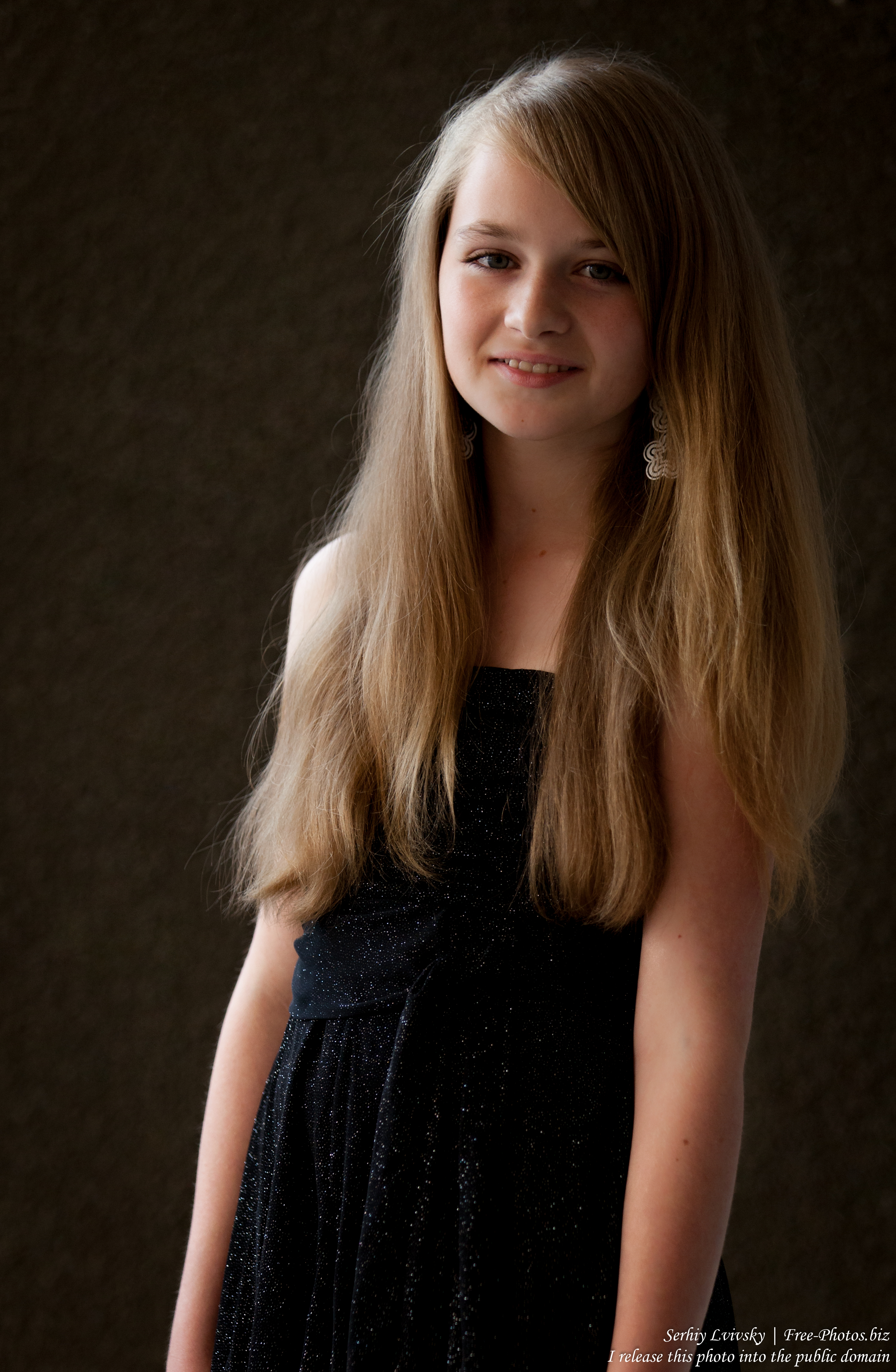 a blond 13-year-old girl photographed in June 2015, picture 4