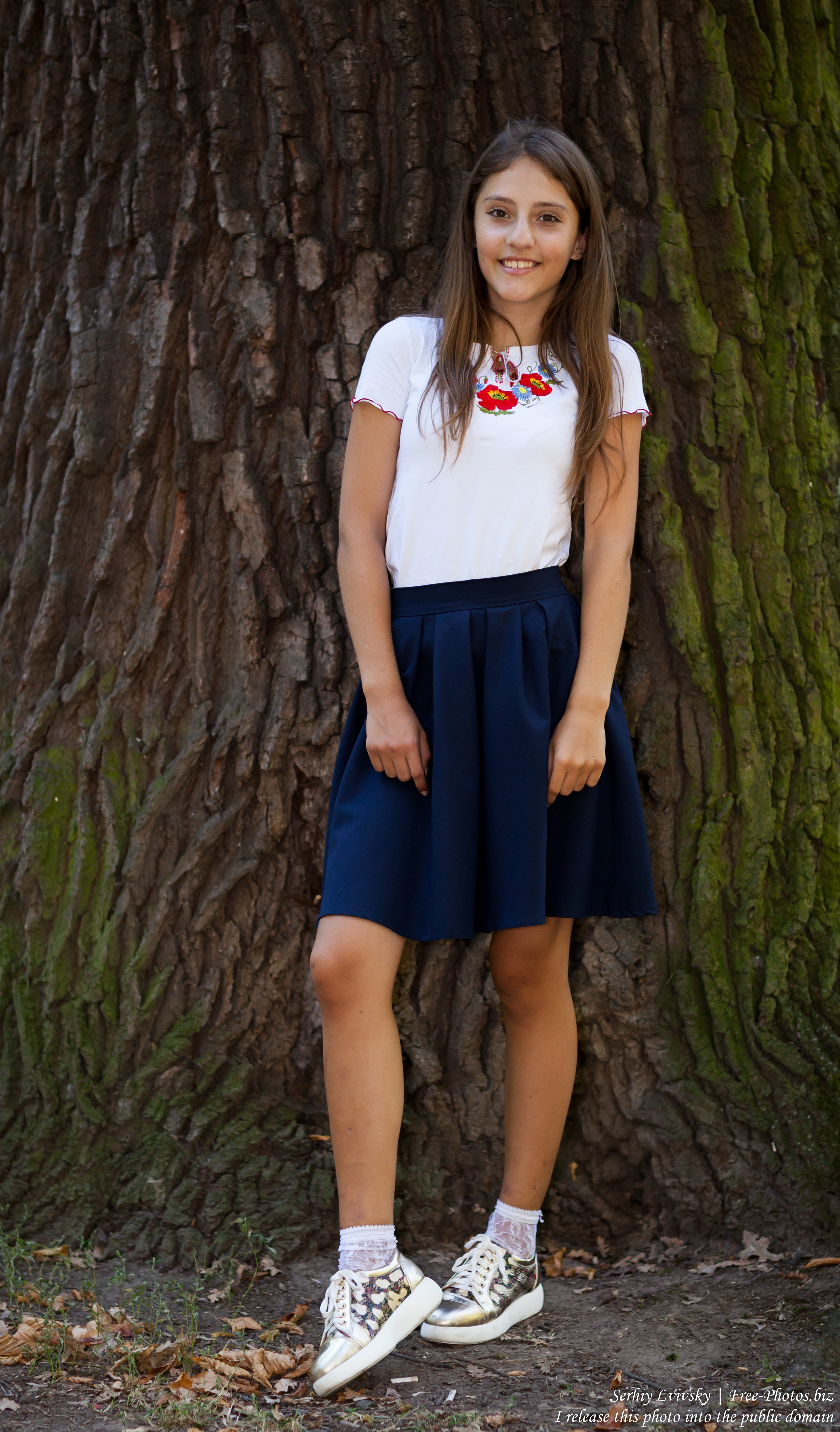 a brunette schoolgirl photographed in September 2016, picture 1