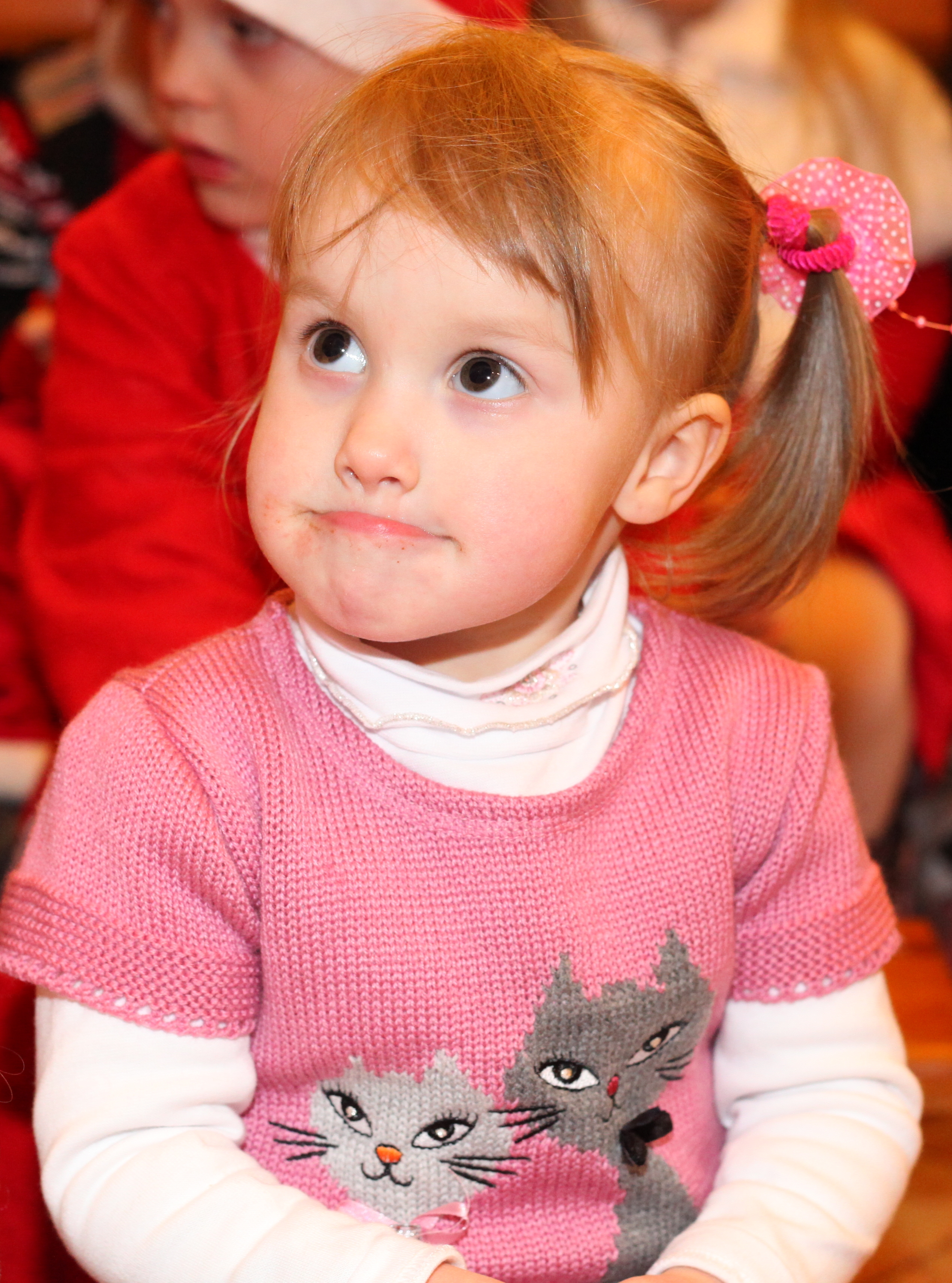 a cute Catholic baby girl at st Nicholas day celebration in a Catholic kindergarten, picture 6