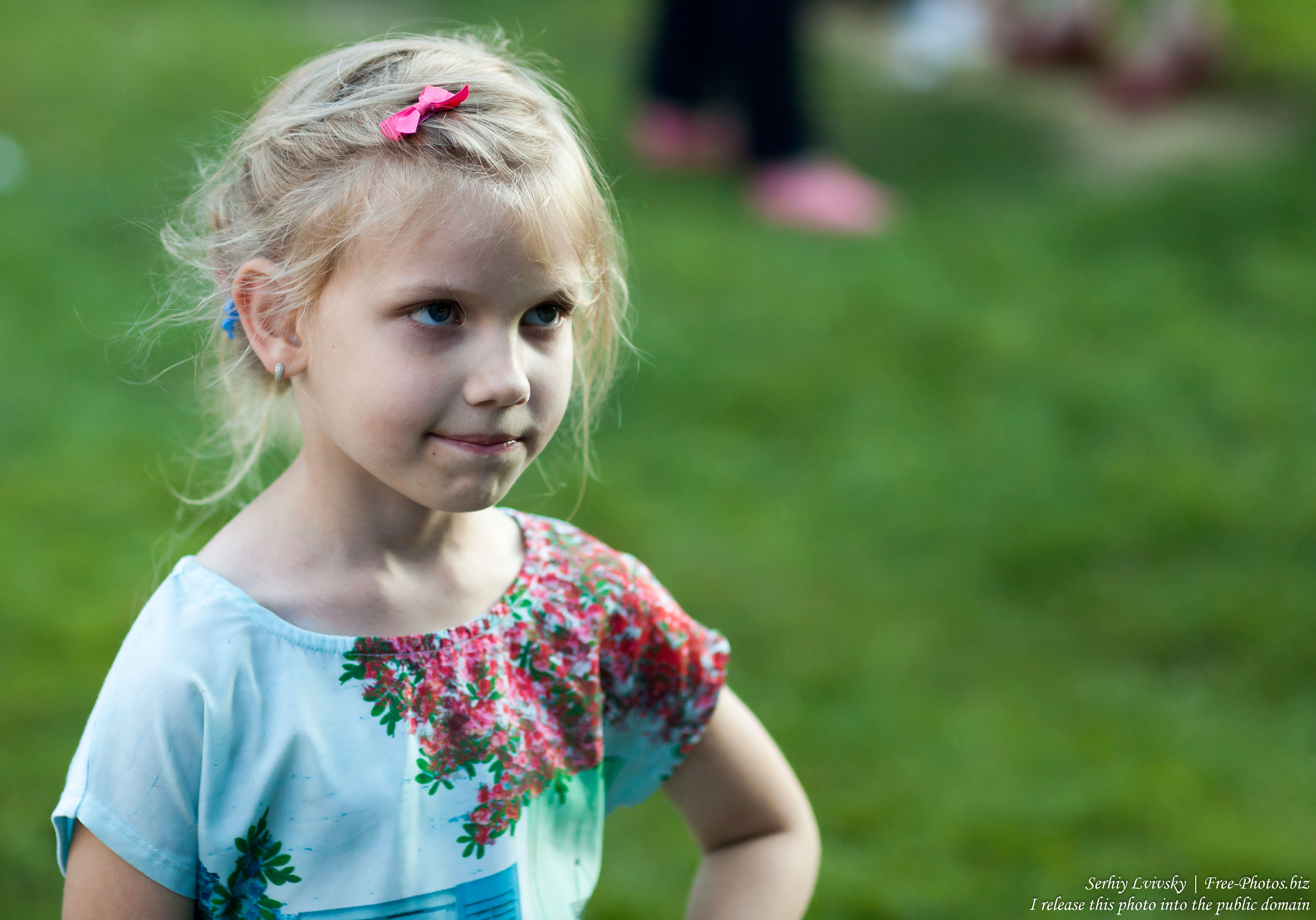 a child girl at Catholic recollections in Poland in July 2017, picture 2