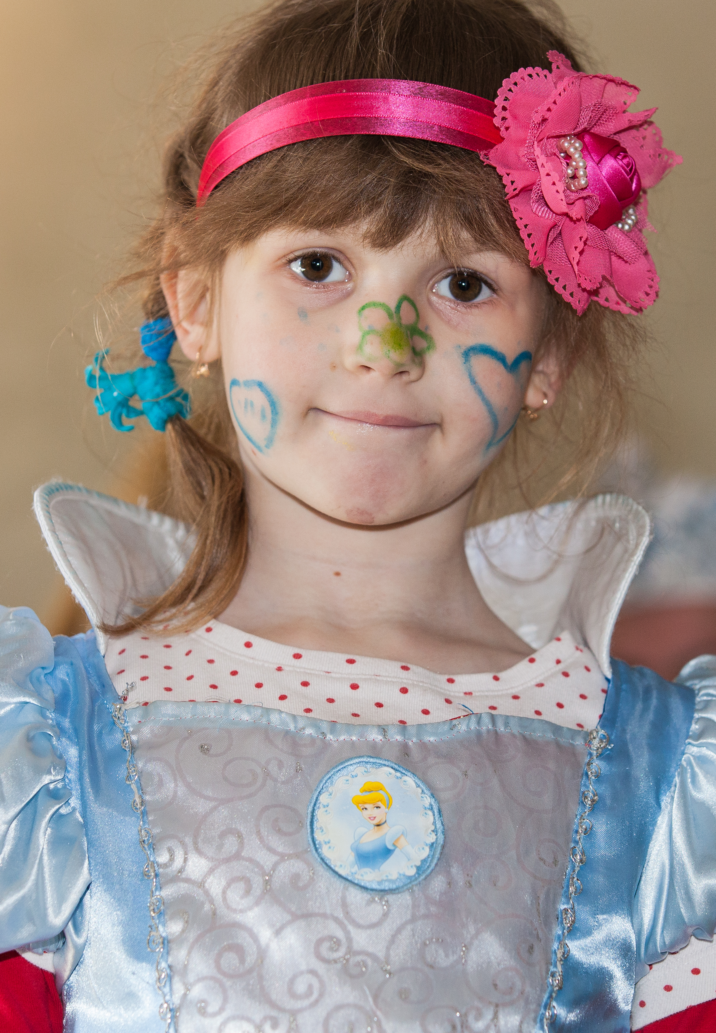 a pretty child girl in a Catholic kindergarten in May 2014