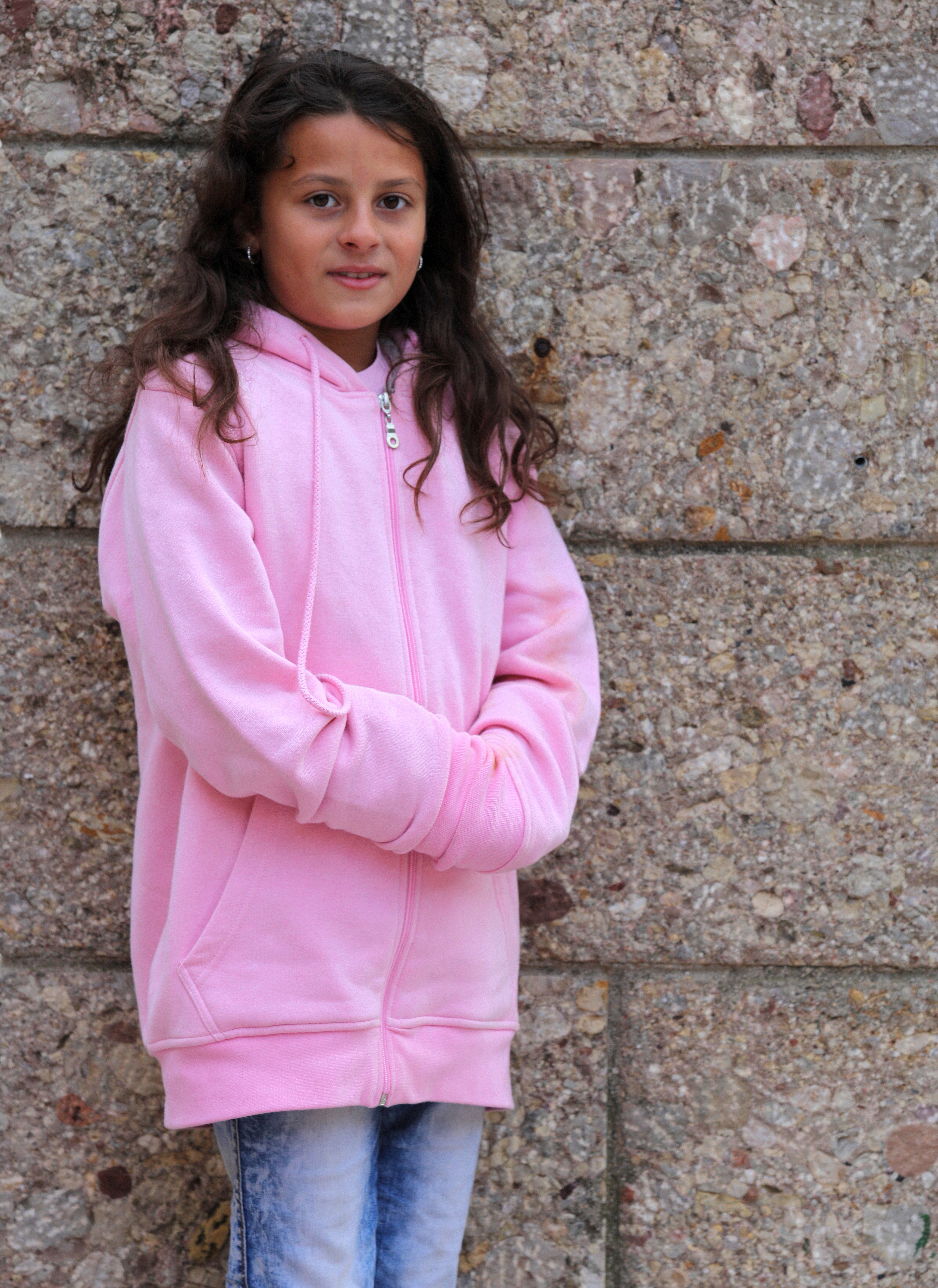 a child girl photographed in Montserrat, Spain, in August 2013, picture 3/4