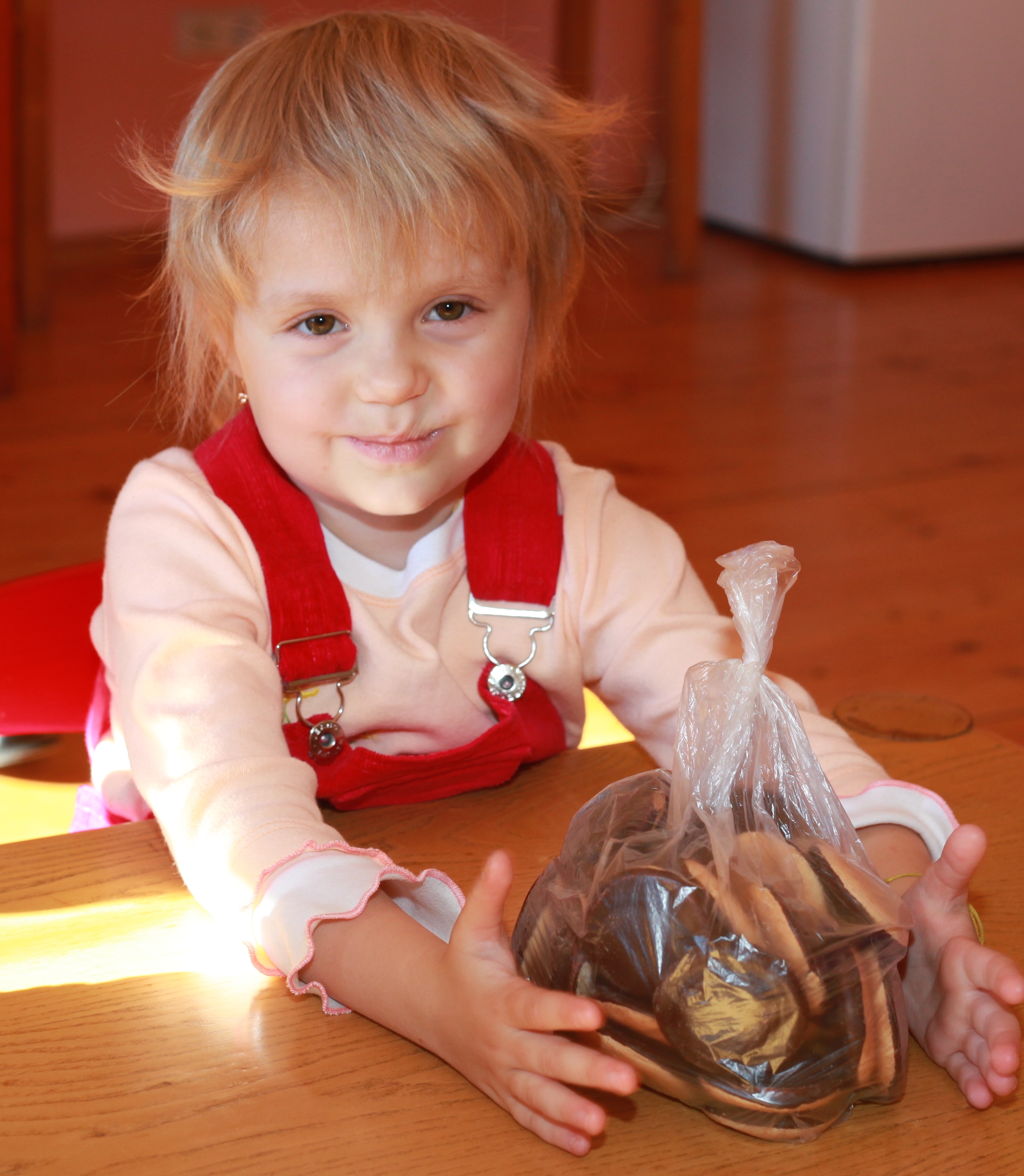 a portrait of a cute blond charming Catholic child girl, photo 1