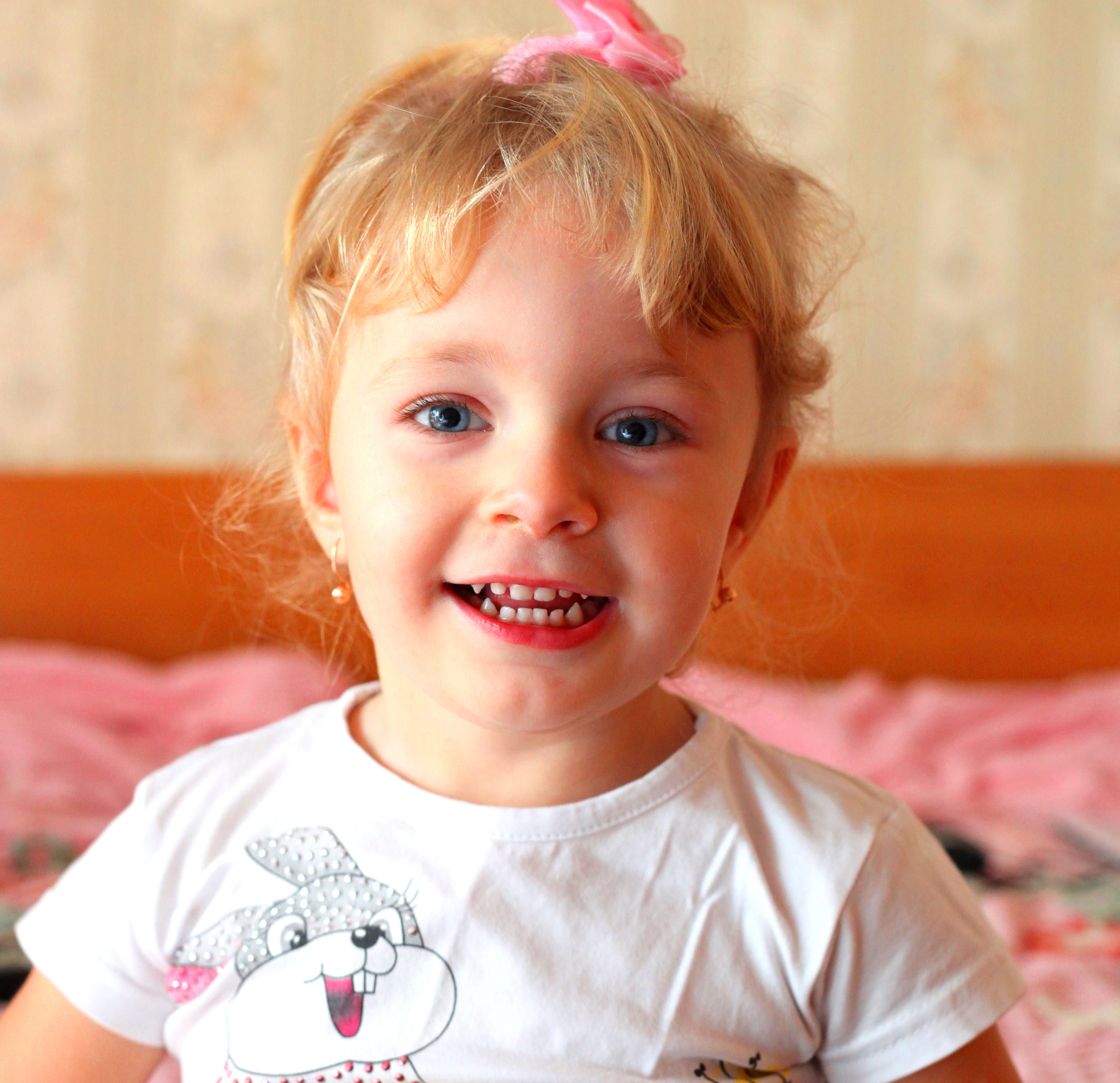 a portrait of a cute blond child girl, picture 1