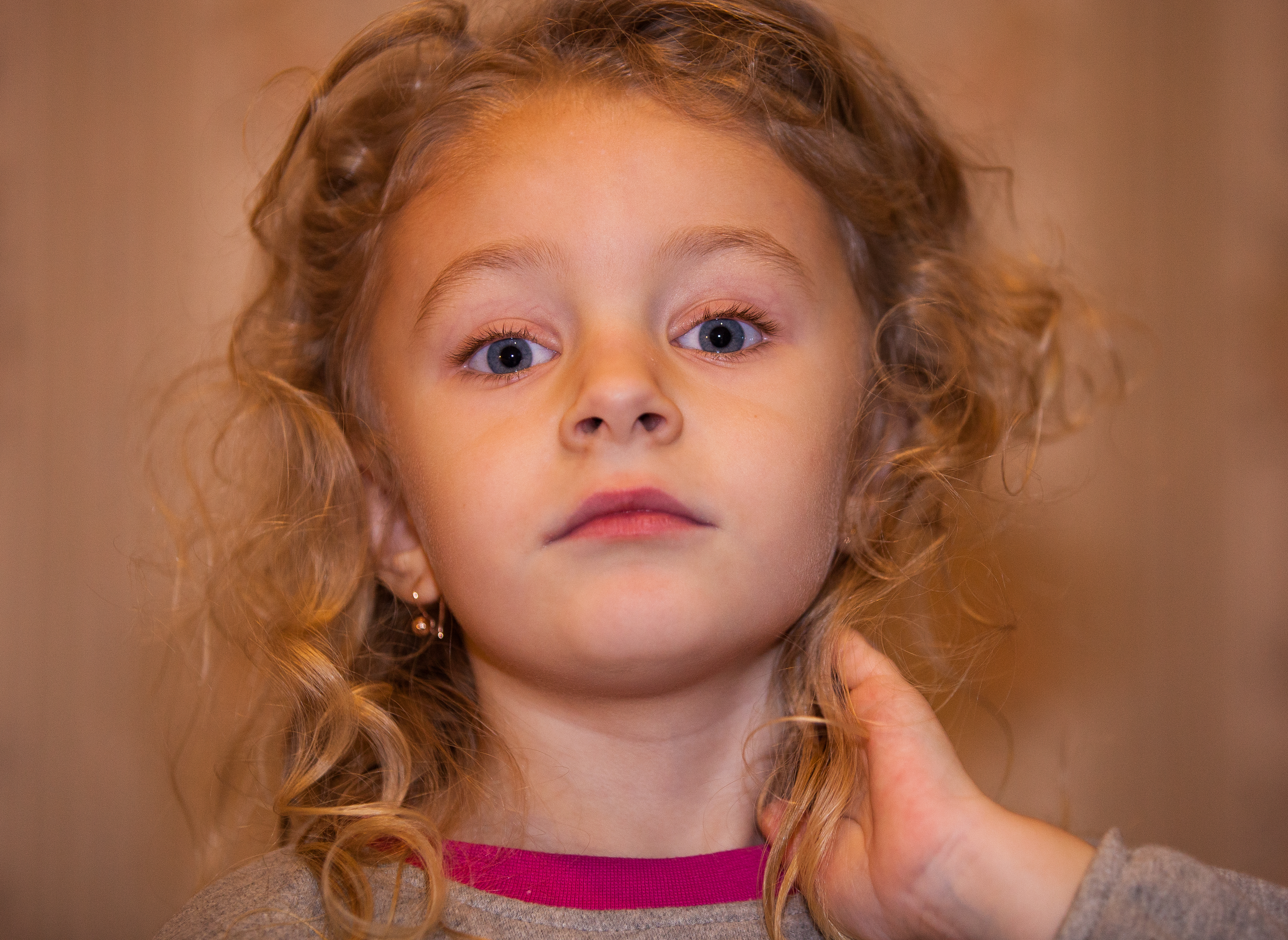 a cute blond child girl photographed in January 2014, photo 3 out of 4