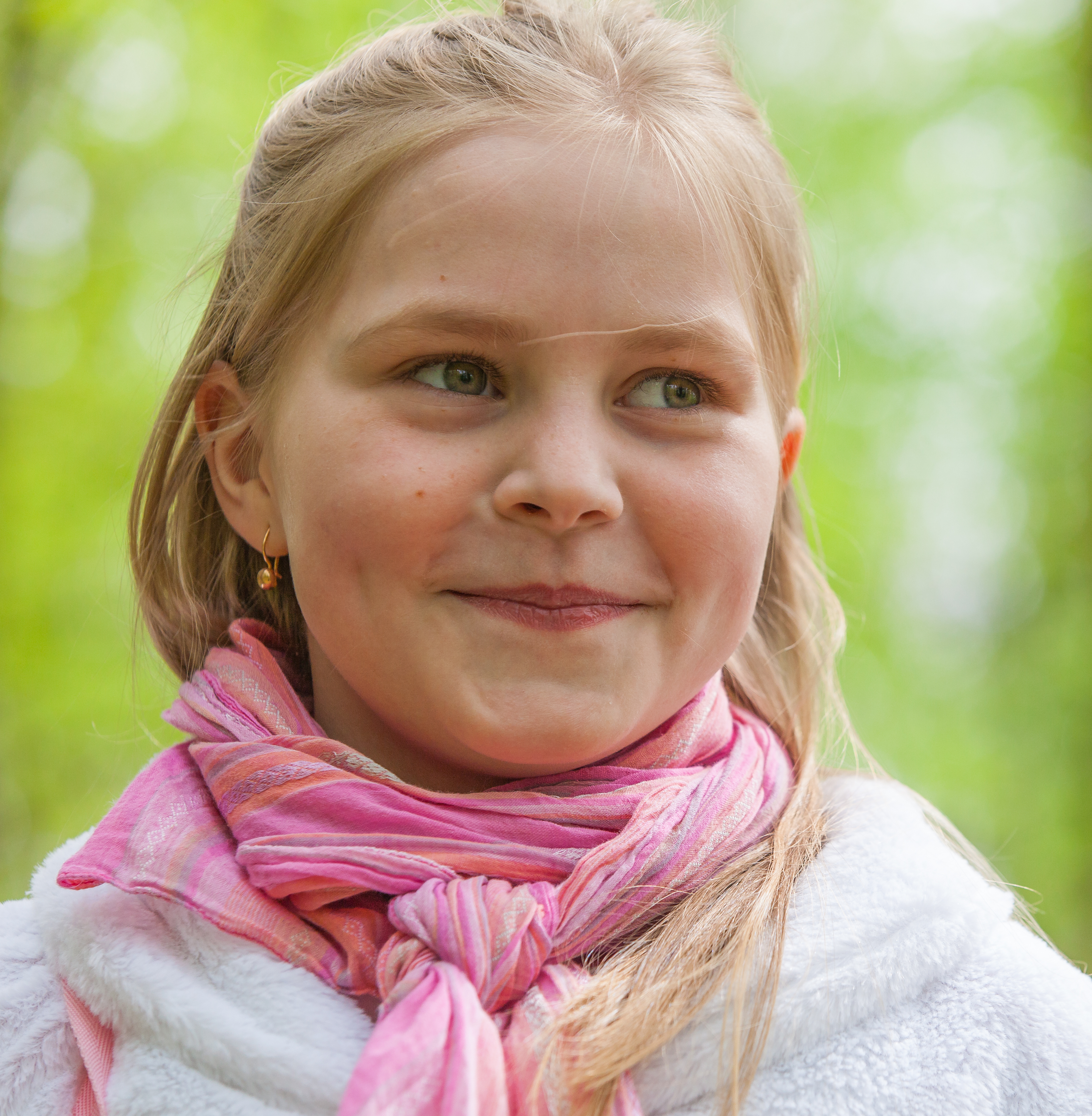a cute Roman-Catholic blond child girl photographed in April 2014, portrait 9/29