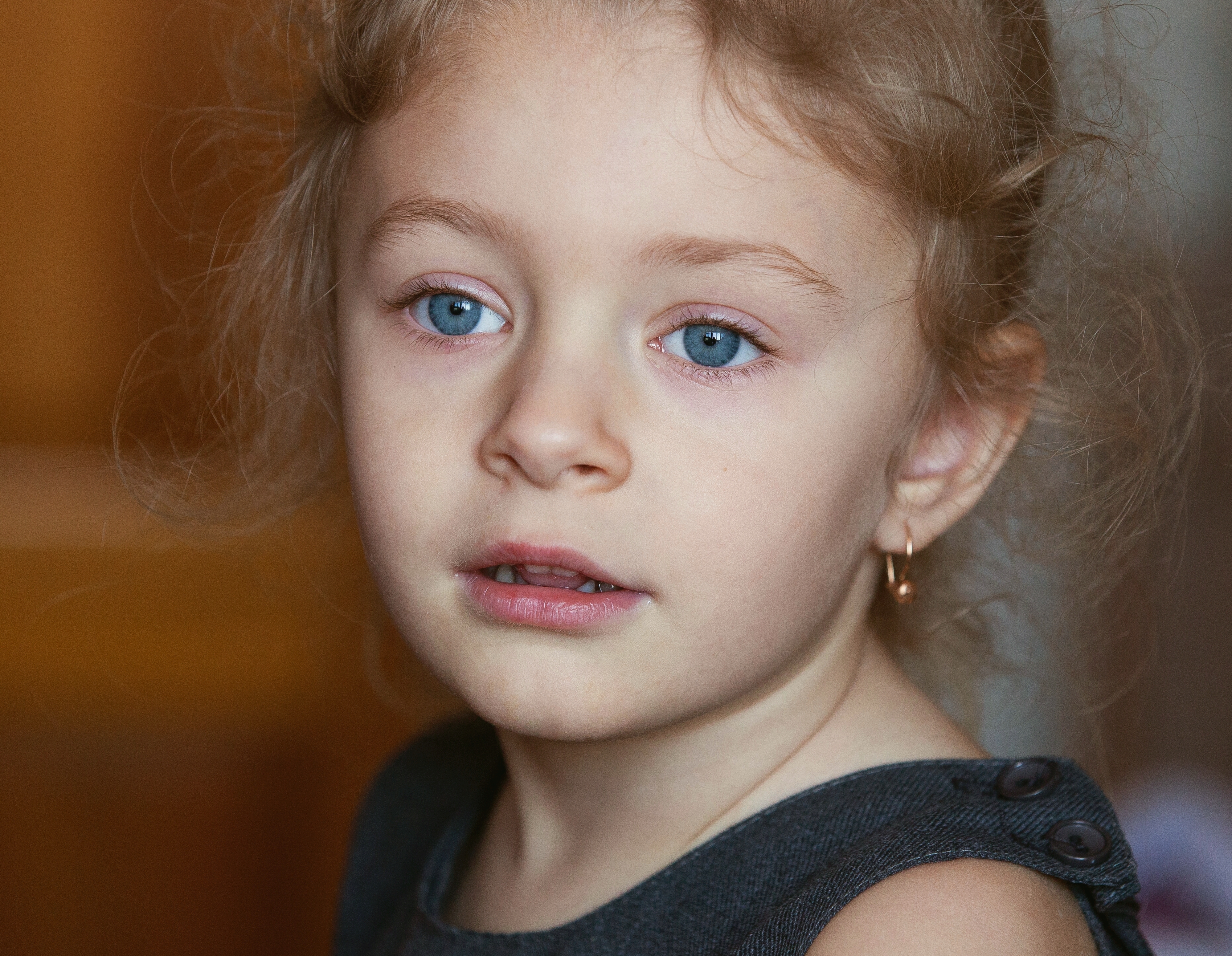 a young cute blond child girl photographed in April 2014