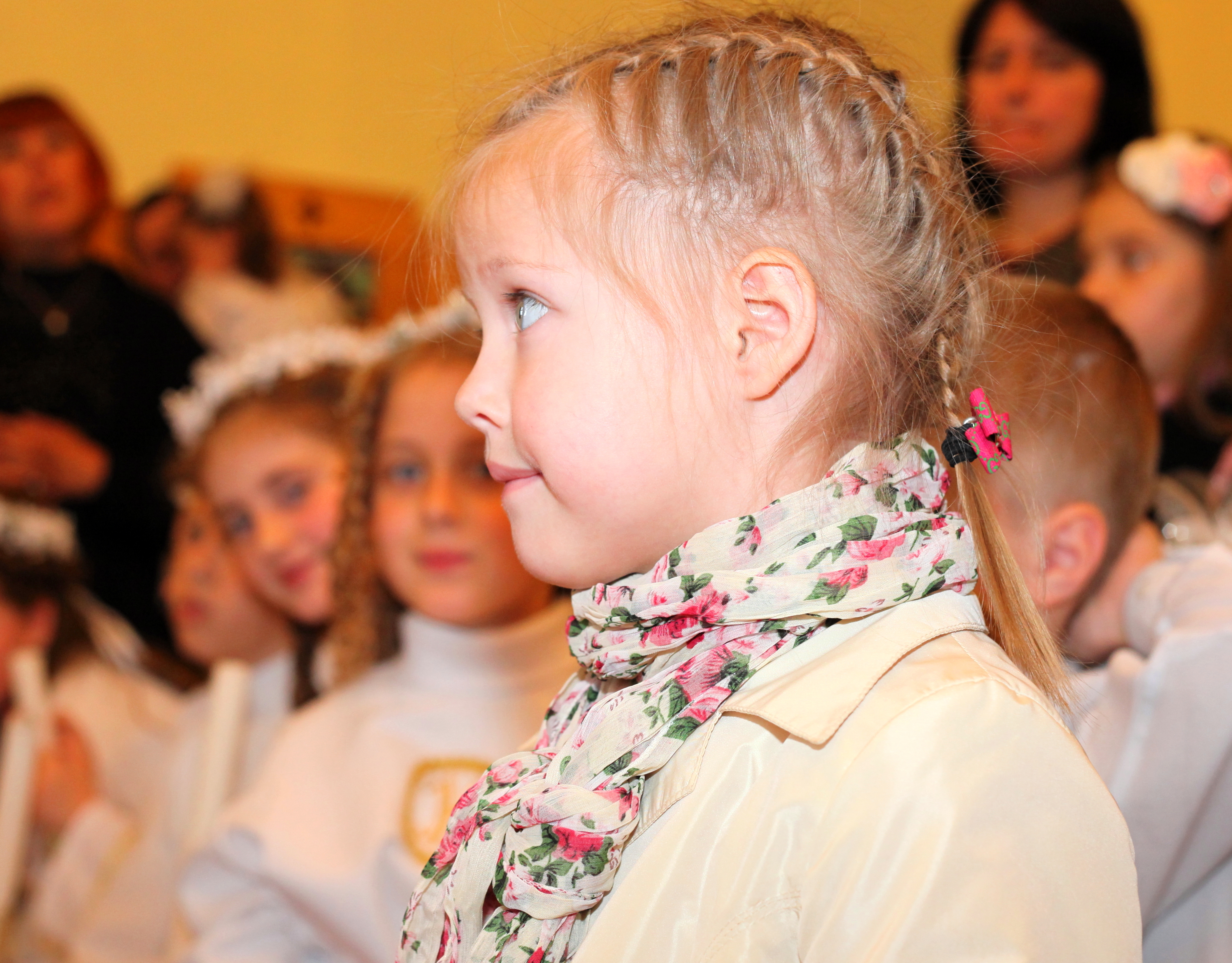 a cute blond child girl in a church in May 2013