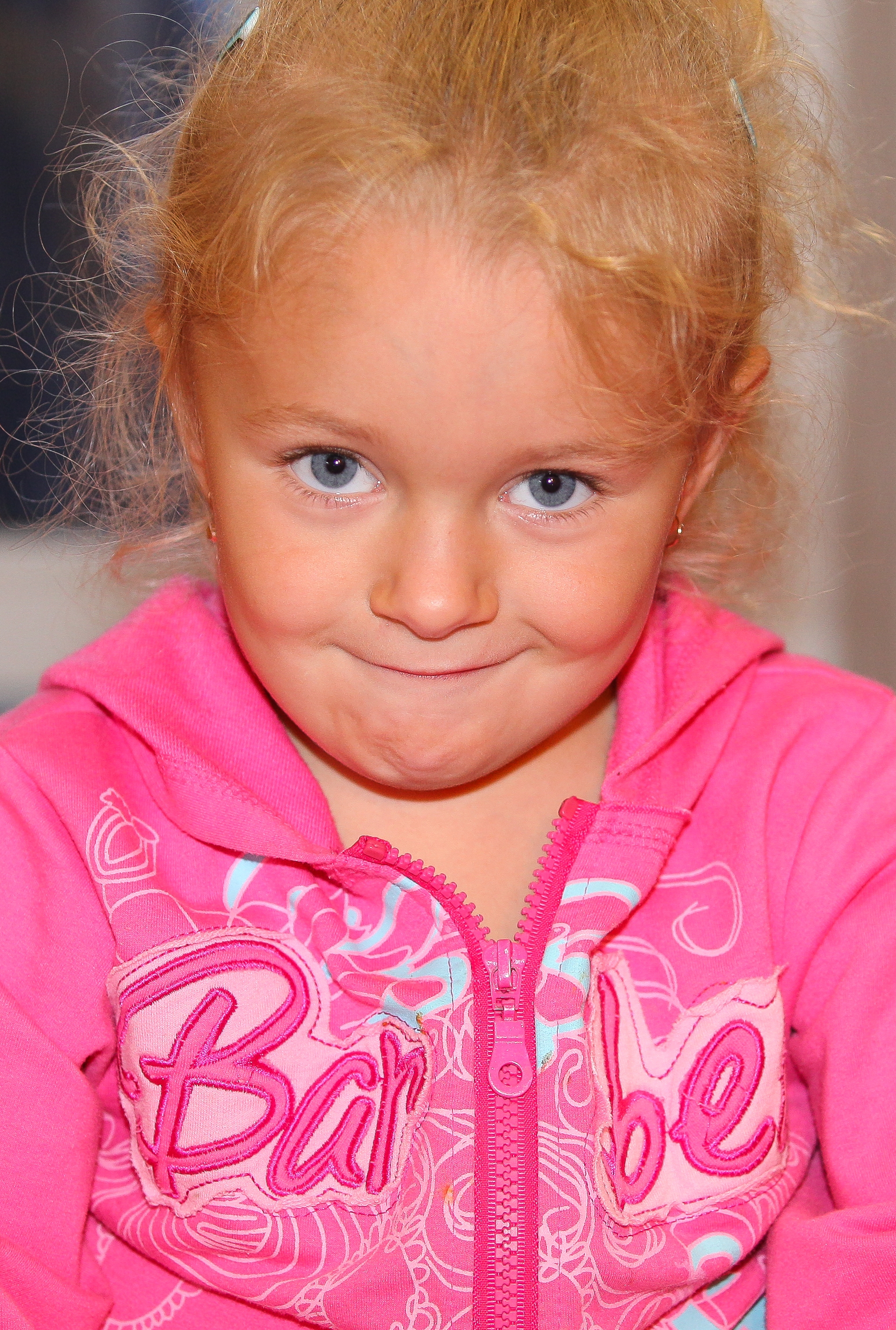 a sweet blond child girl photographed in September 2013, picture 2/4