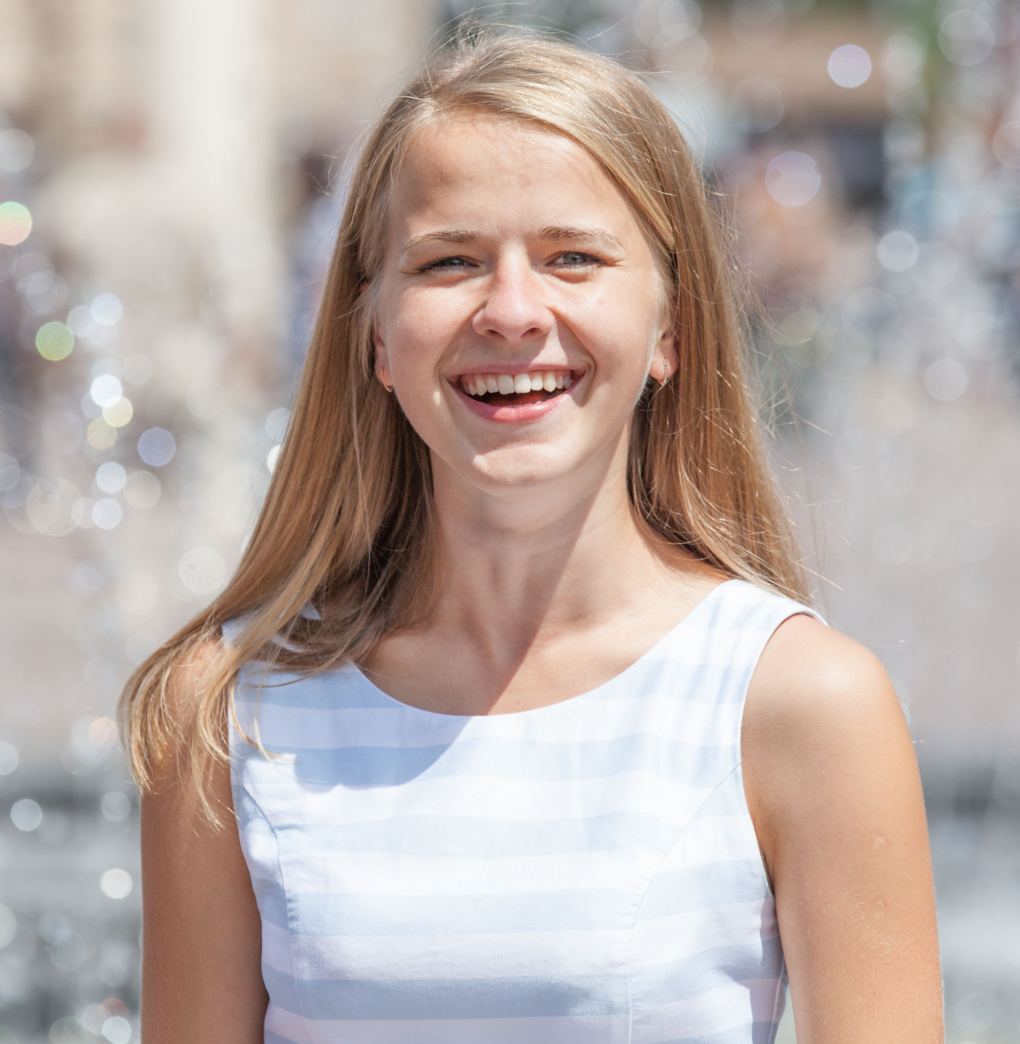 a young cute blond girl photographed in July 2014, picture 1