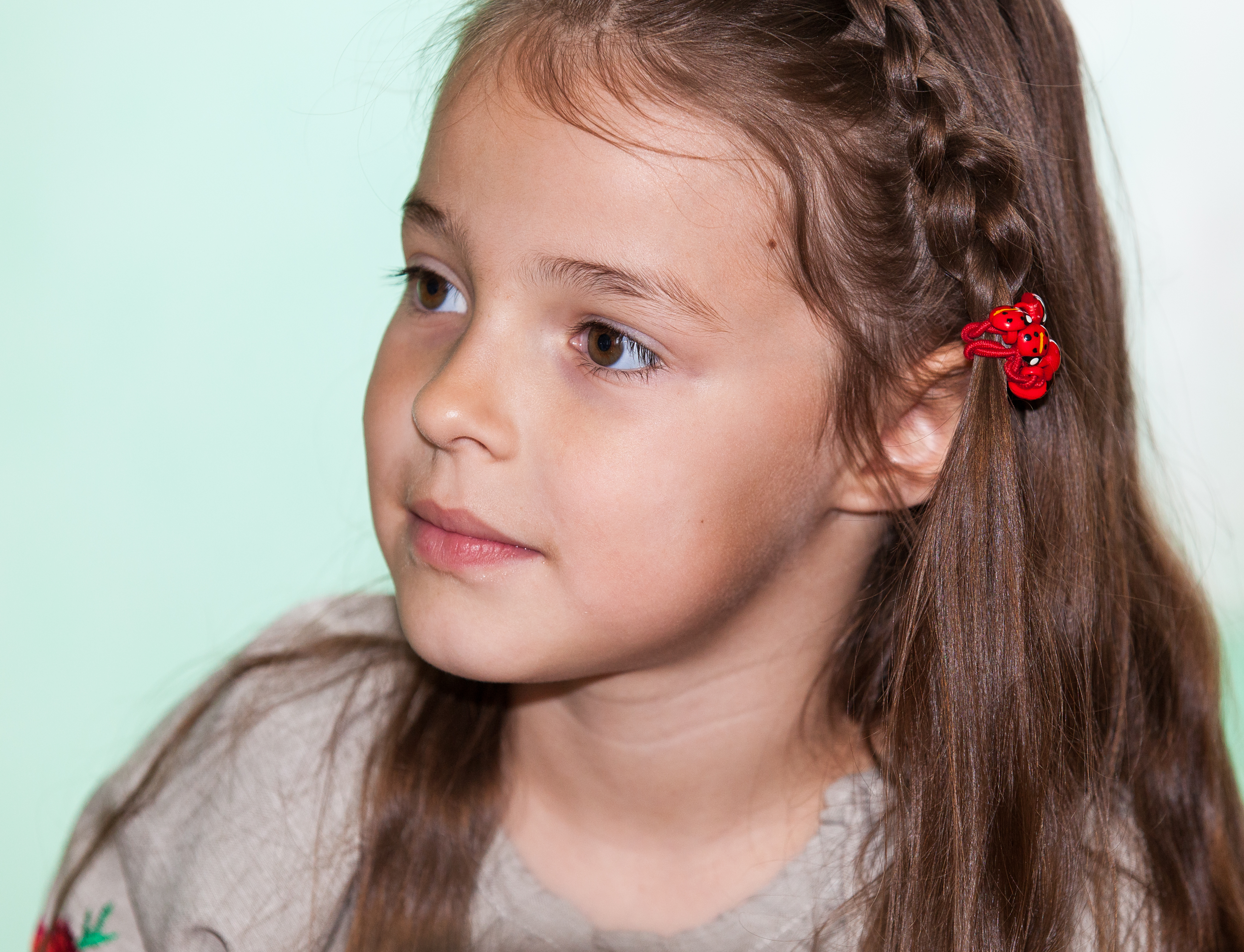a young cute brunette schoolgirl photographed in May 2014