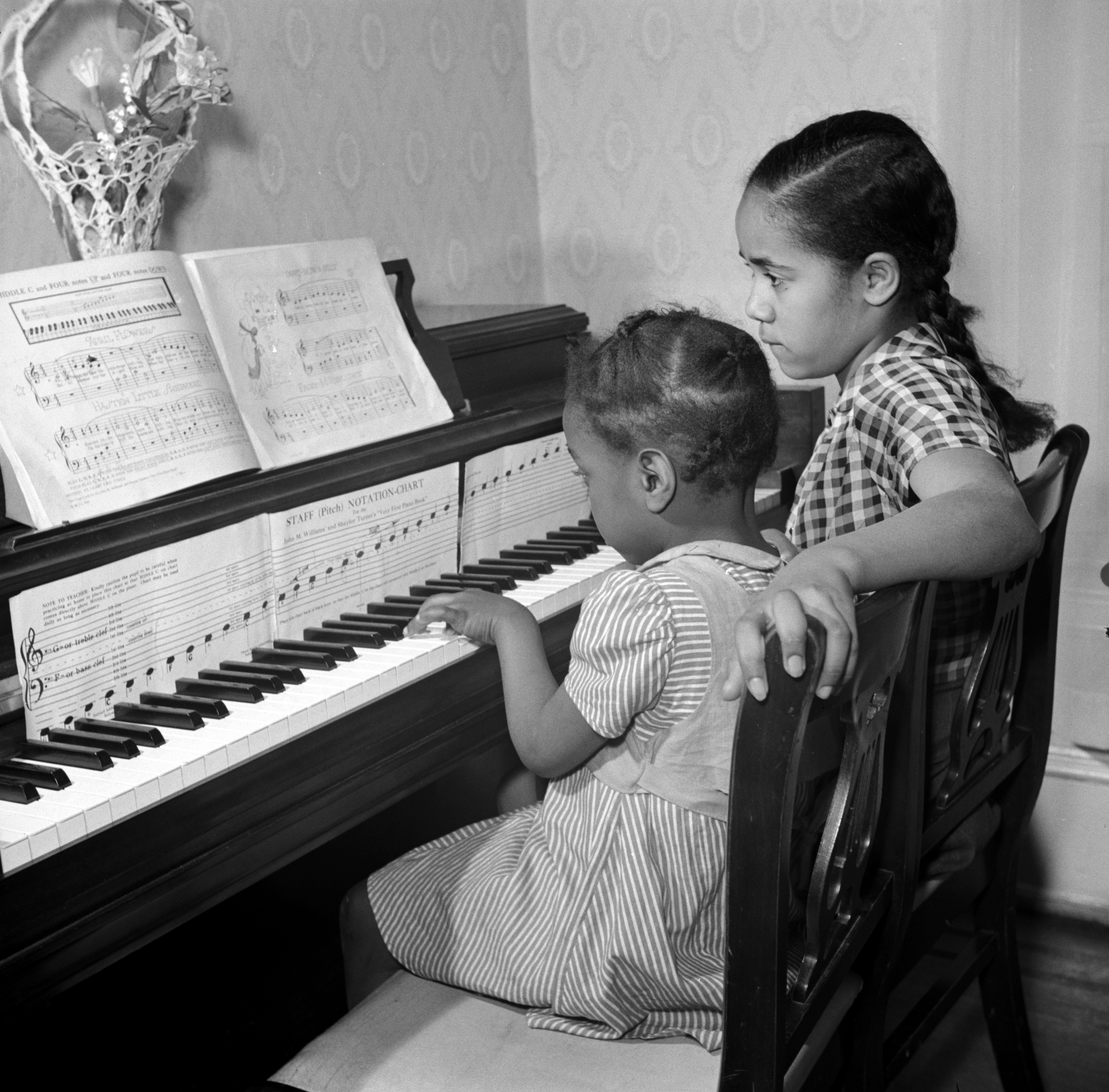 All the family of Jewal Mazique take music lessons