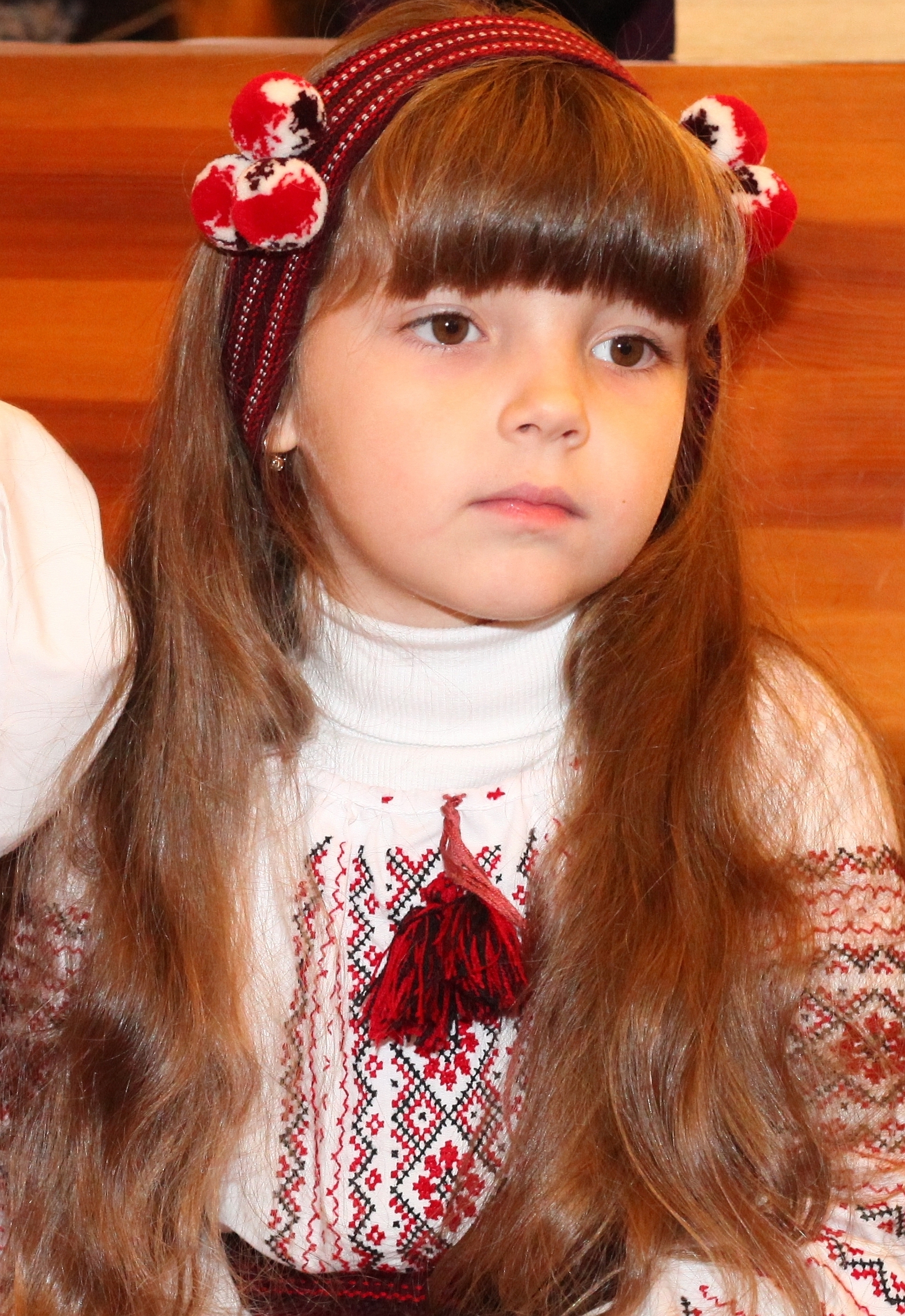 an amazingly beautiful brunette Catholic child girl in a Catholic kindergarten, photo 2