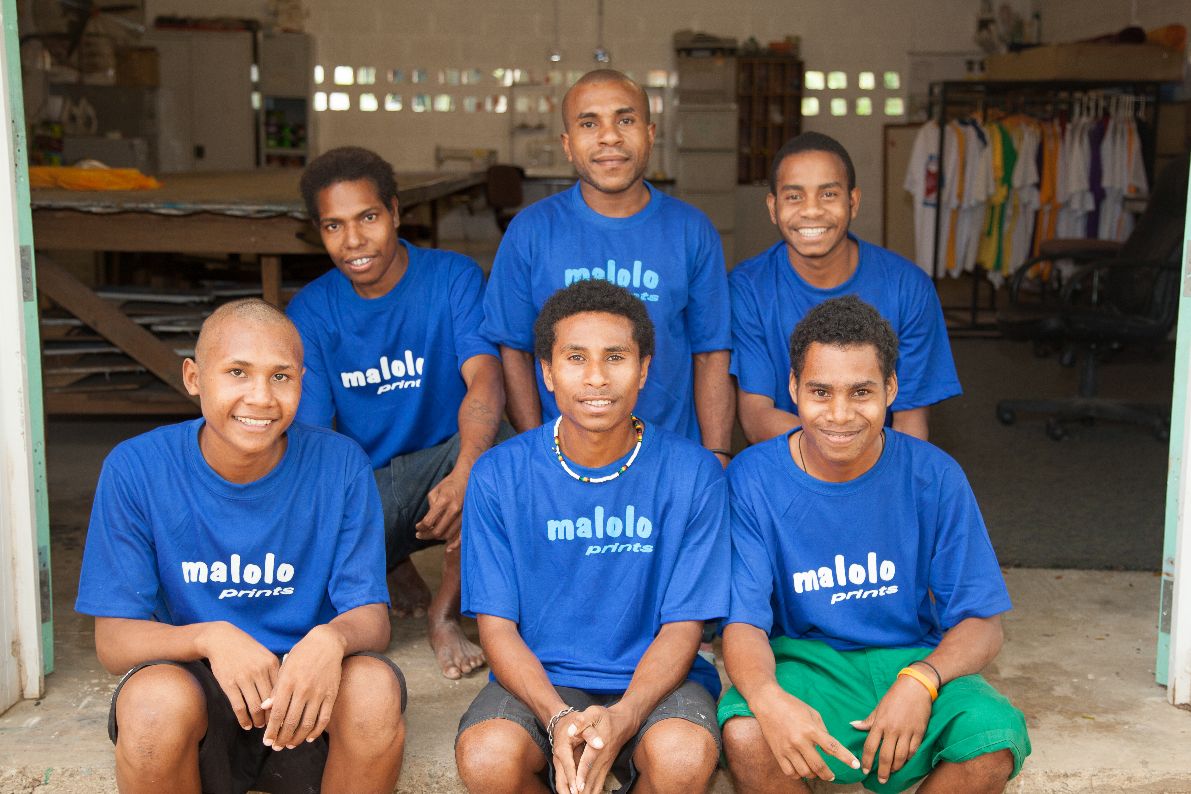 Boys from City Mission Farm running at the onsite print shop which helps to earn money for the farm and teach the boys new skills. (10677973284)