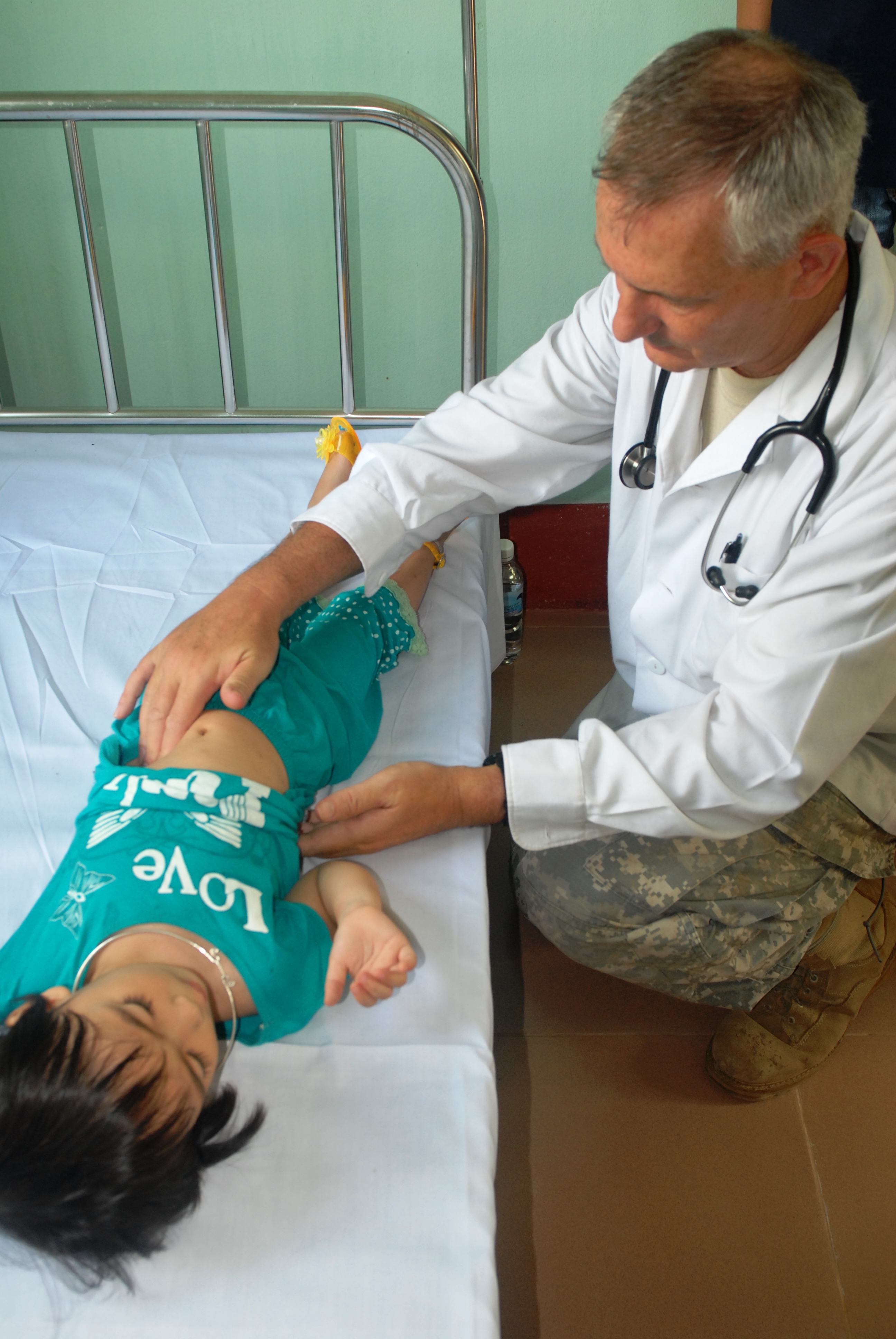 Child examined by doctor