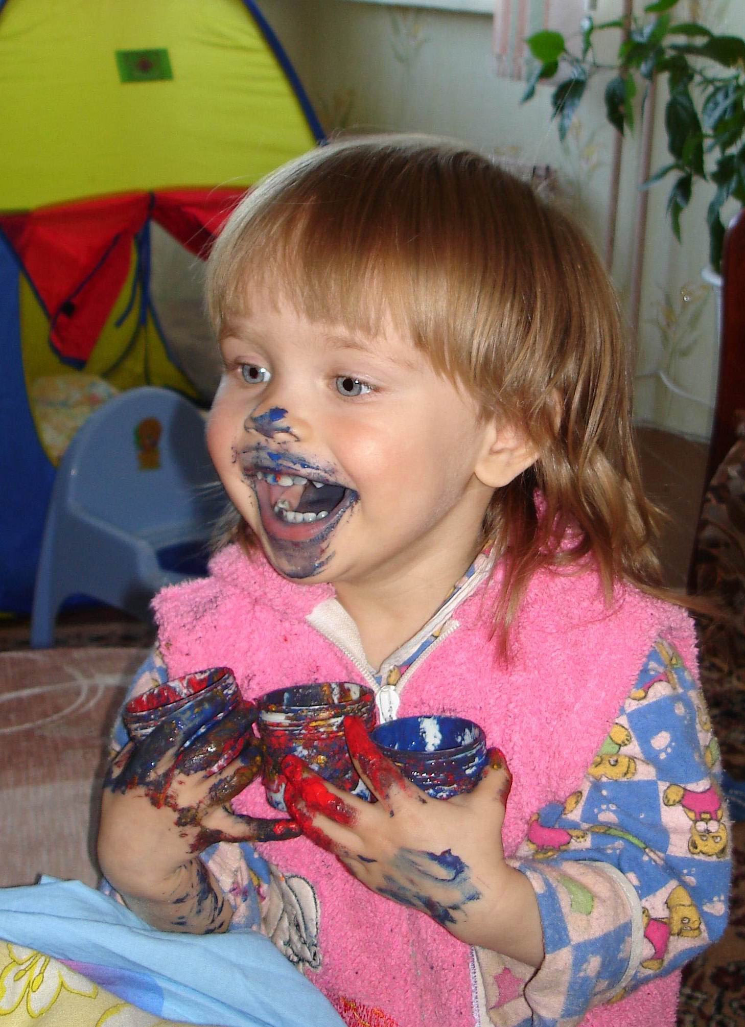 Girl eating paint