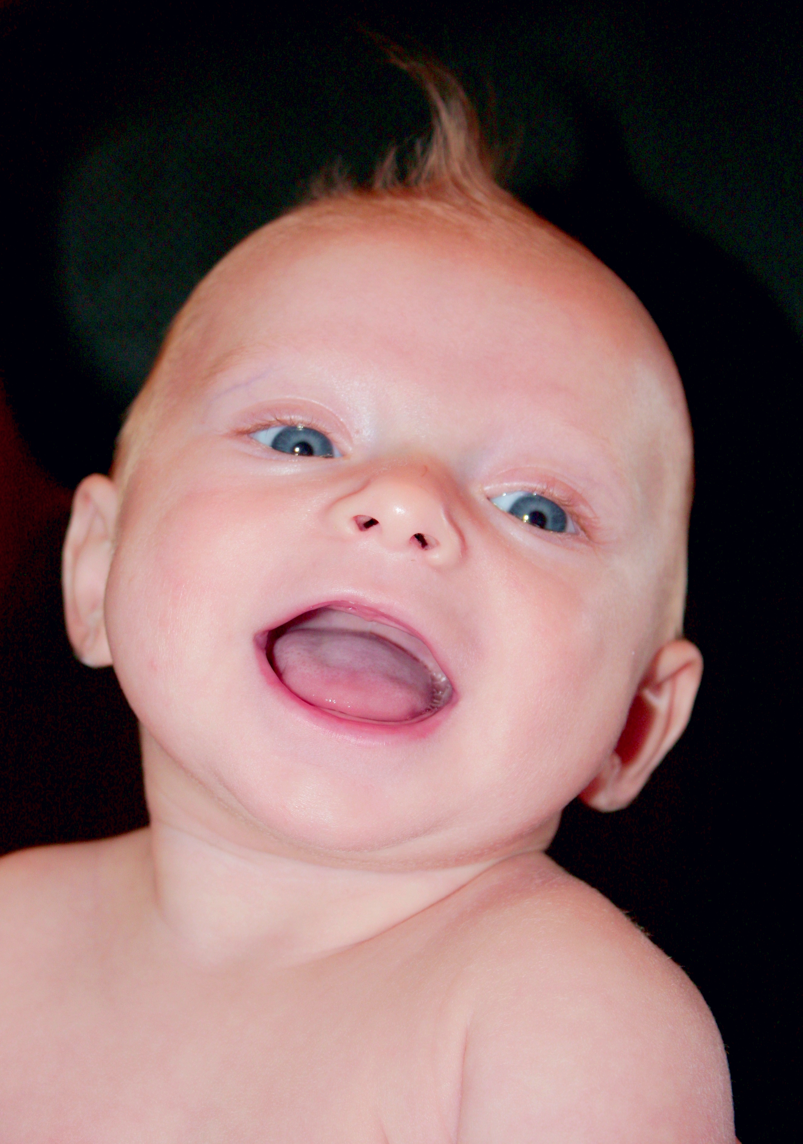 Innocent baby laughing
