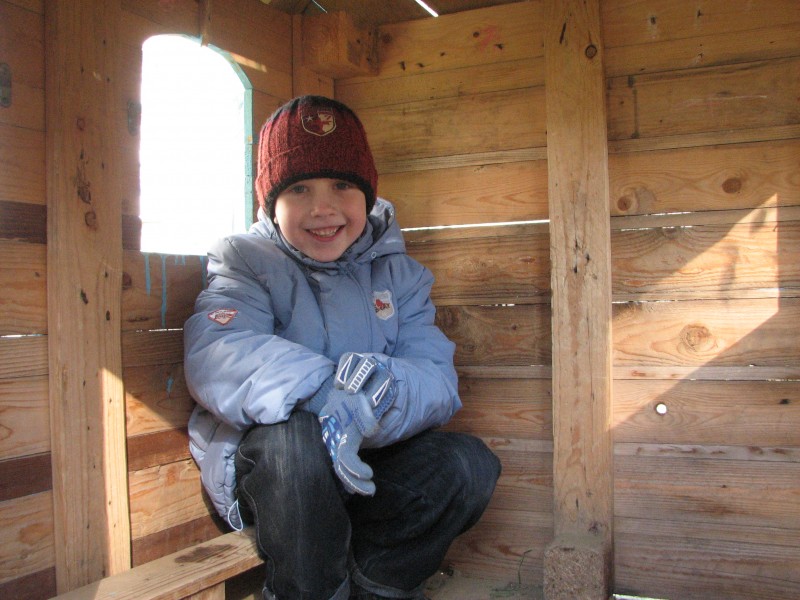 A boy in a hut, picture 3