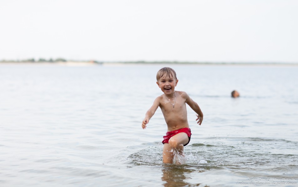a 4-year-old boy enjoying water in August 2017