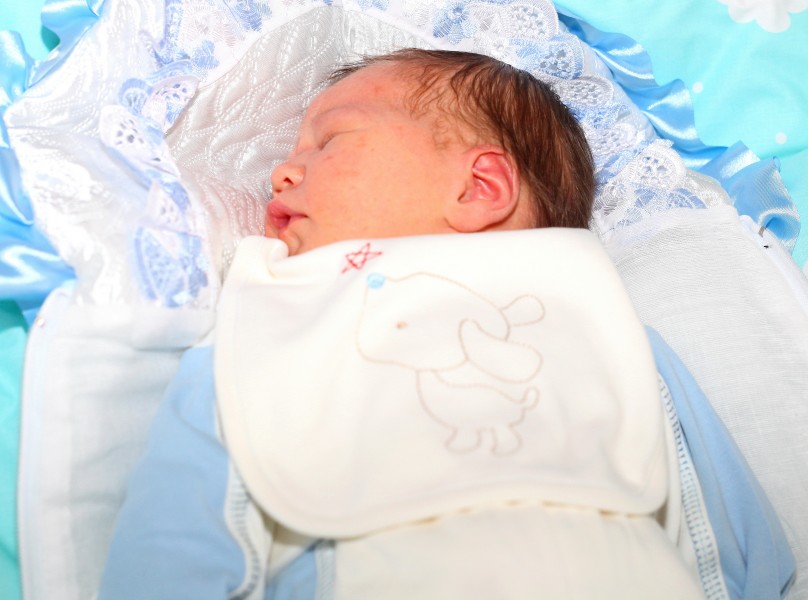 a 5-day old baby boy, photographed in June 2013