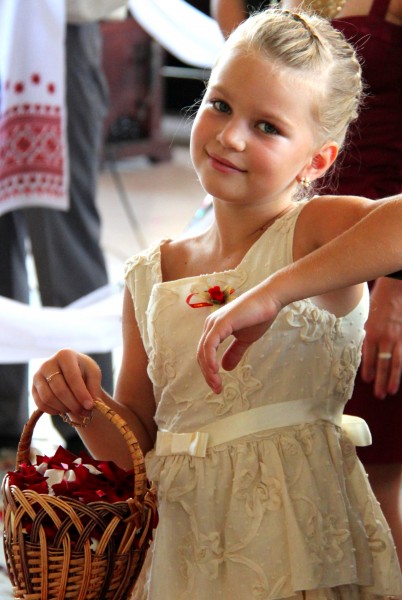 a beautiful blond child girl at a wedding party, photo 3