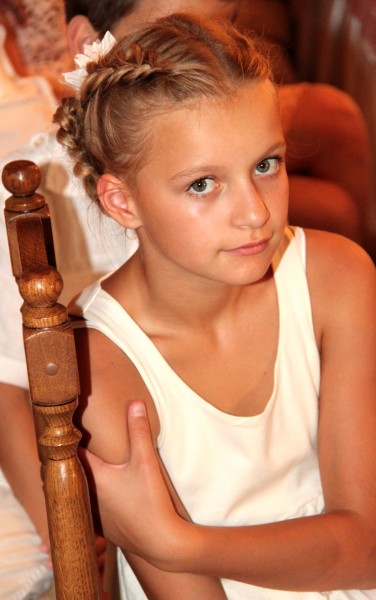 a beautiful charming blond child girl at a wedding party, photo 8