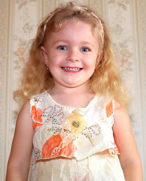 a beautiful smiling girl photographed in May 2013, picture 1