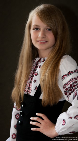 a blond 13-year-old girl photographed in June 2015, picture 16