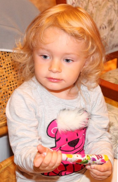 A cute blond child girl, photo 3.