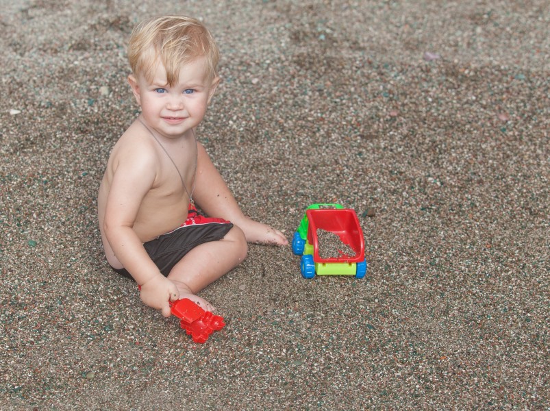 a 1-year-old boy at the beach in Montenegro in August 2014, picture 5