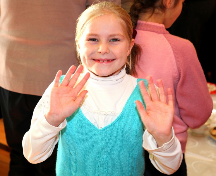 a charming beautiful blond Catholic child girl, picture 1