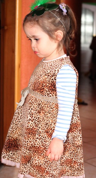 a cute amazing child girl about to start crying in a Catholic kindergarten, photo 5
