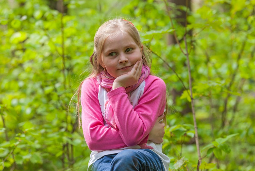 a cute Roman-Catholic blond child girl photographed in April 2014, portrait 27/29