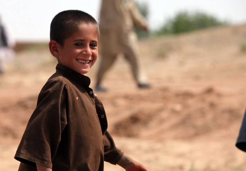 A local Afghan child greets Marines (5001407162)