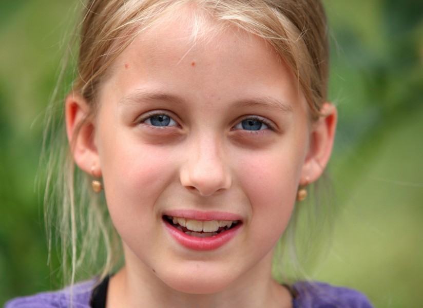 a beautiful sweet blond young Roman-Catholic girl in a Christian camp in July 2013, portrait 2/5