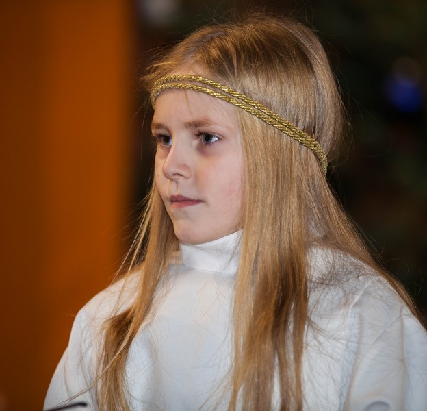 a young Catholic girl performing in a play in December 2013, photo 1 out of 2