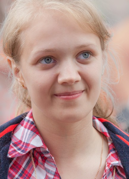 a young cute blond girl photographed in July 2014, picture 4